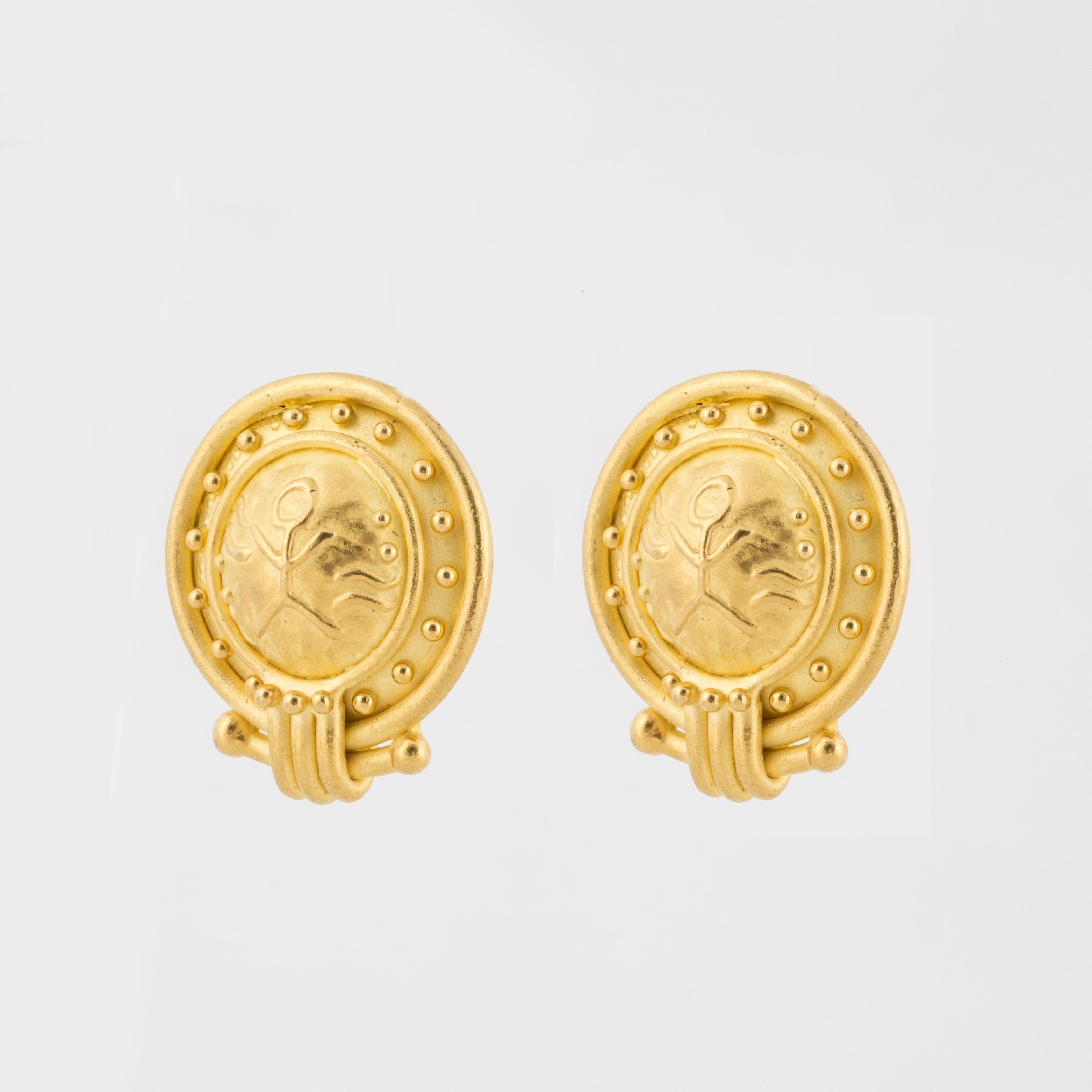 22K yellow gold earrings by Denise Roberge.  Features stick figures in the center with a soft brushed finish.  Measure 1