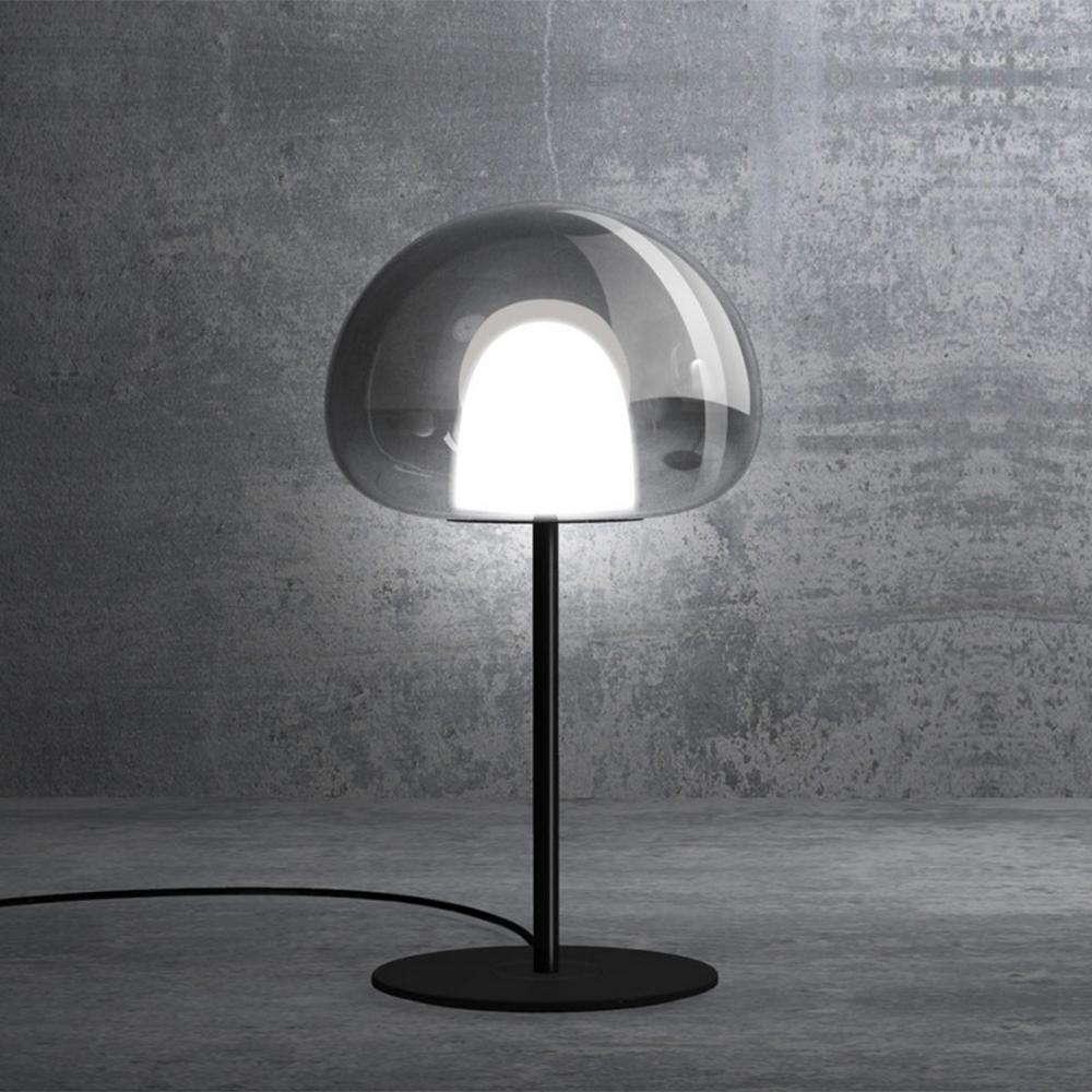 Table lamp Denkan high with painted iron base
in matte black finish and with blown glass shade.
With 1 source, LED 11,6 Watts (2700K, CRI>90, 1596Lm).
Dimmer included.