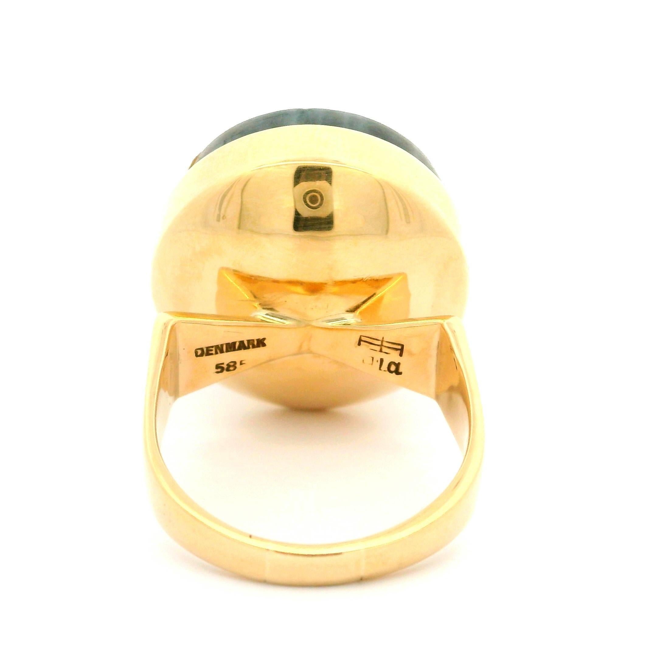 –Stone(s)–
(1) Natural Genuine Labradorite - Round Cabochon Cut - Bezel Set - Brown Base Color w/ Blue, Green & White Play of Colors- 21.2mm (approx.)

Material: Solis 14k Yellow gold
Weight: 15.74 Grams
Ring Size: 10.0 ( fitted on finger, please