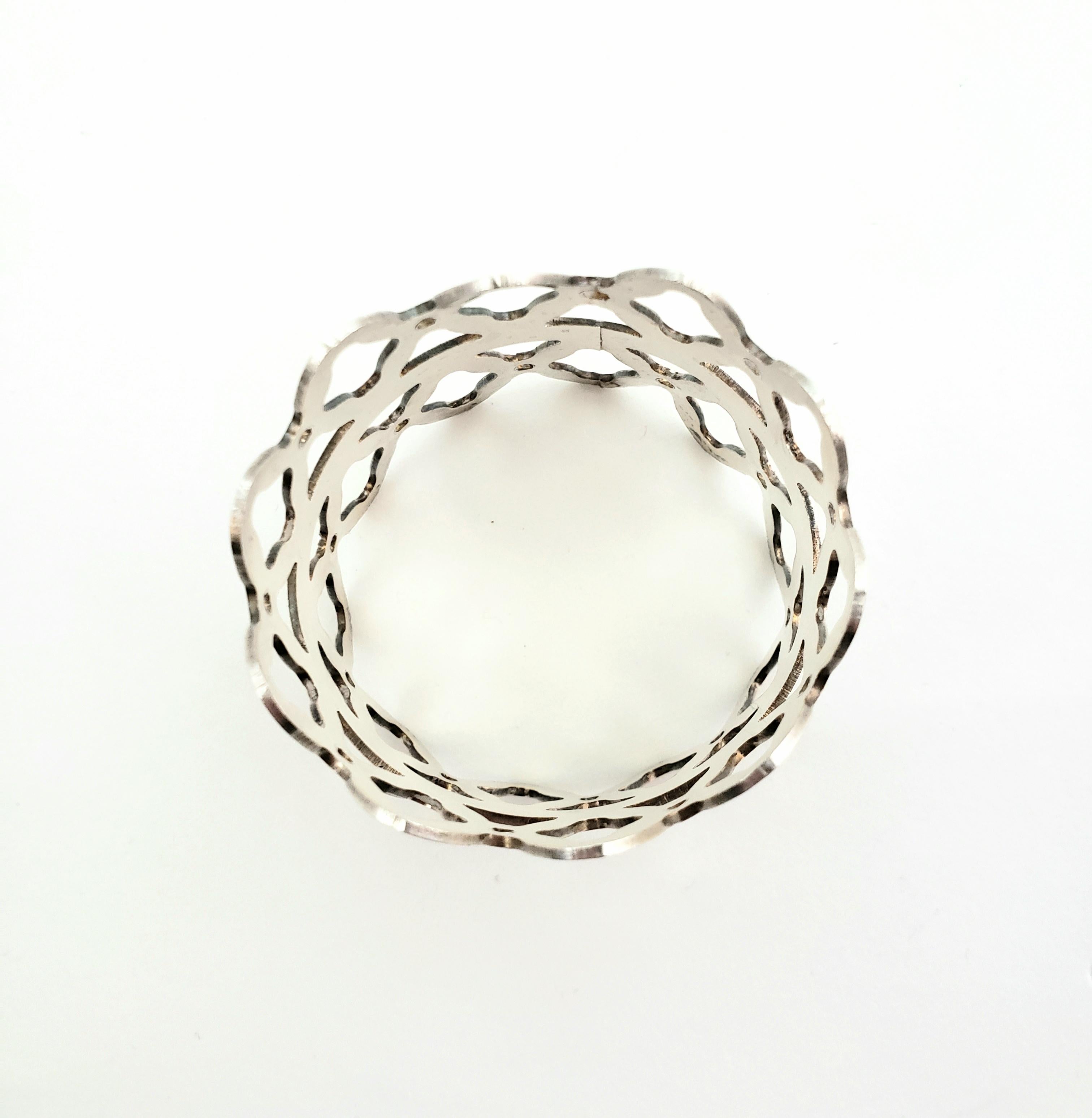 Denmark 936 Sterling Silver Napkin Ring

This is a lovely Denmark sterling silver napkin ring.

Measurements:     Napkin rings measures 1 and 1/2 inches in diameter;  5 and 1/2 inches in circumference, and 1 and 1/2 inches in height .

Weight:  22.5