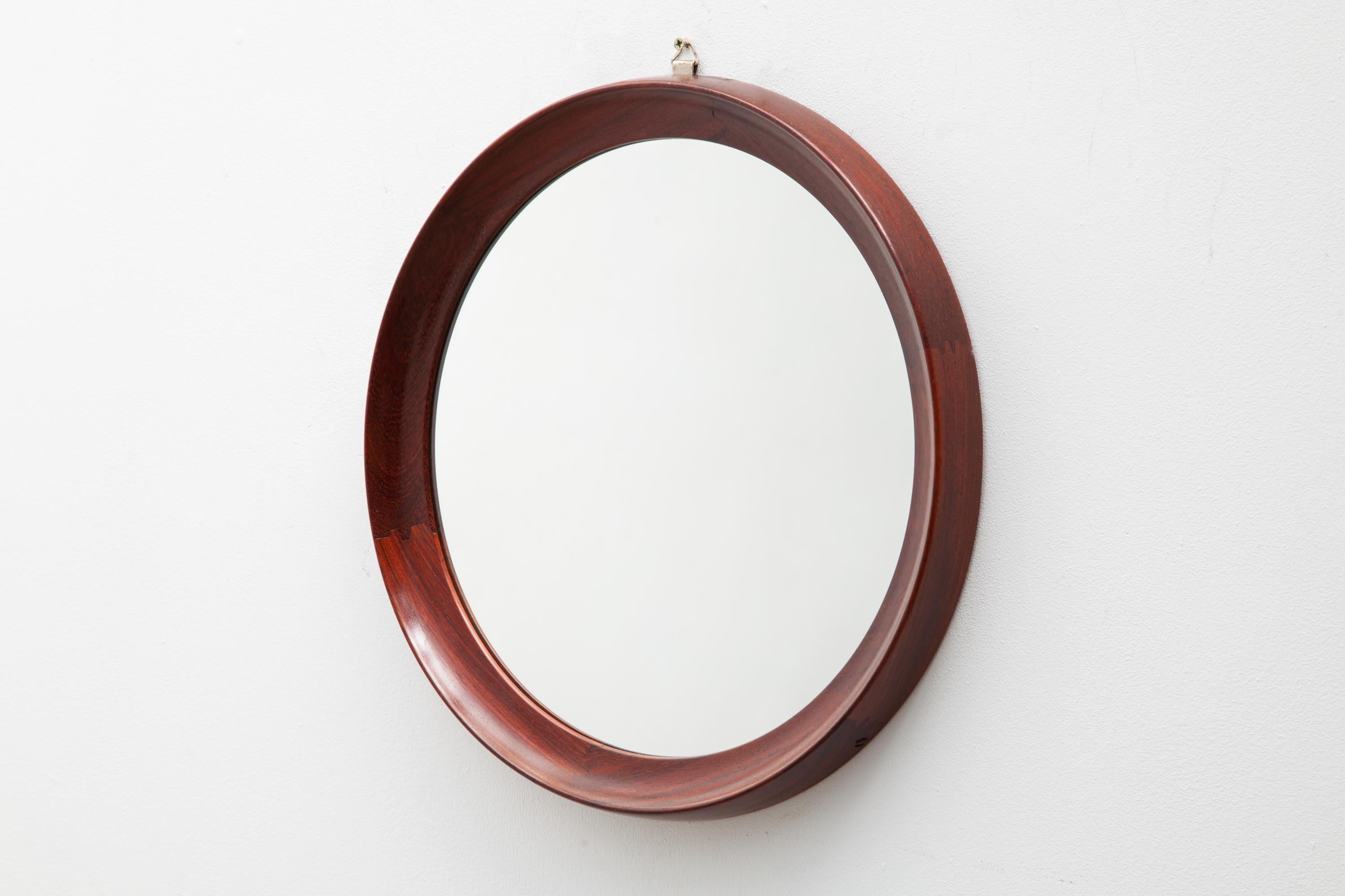 Vintage circular mirror in solid teakwood. Beautiful bevel edge and joinery.Midcentury mirror 40 diameter x 3 depth cm.  