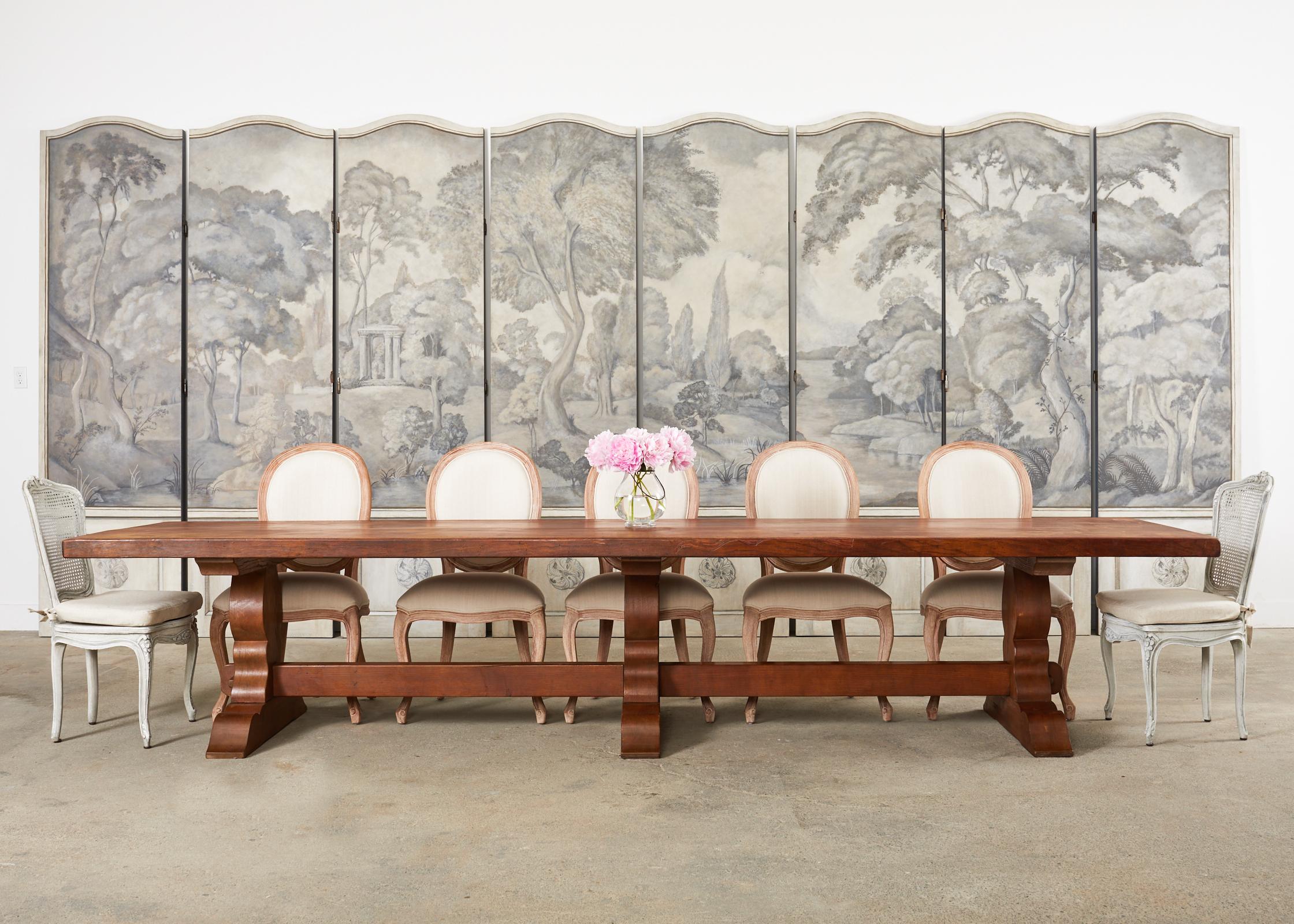 Monumental eight panel floor screen featuring a serene European landscape in Grisaille. Bespoke screen from Dennis & Leen in Los Angeles, CA measuring over 20 feet wide and nine feet high. Each panel has a serpentine shaped top and heavy metal