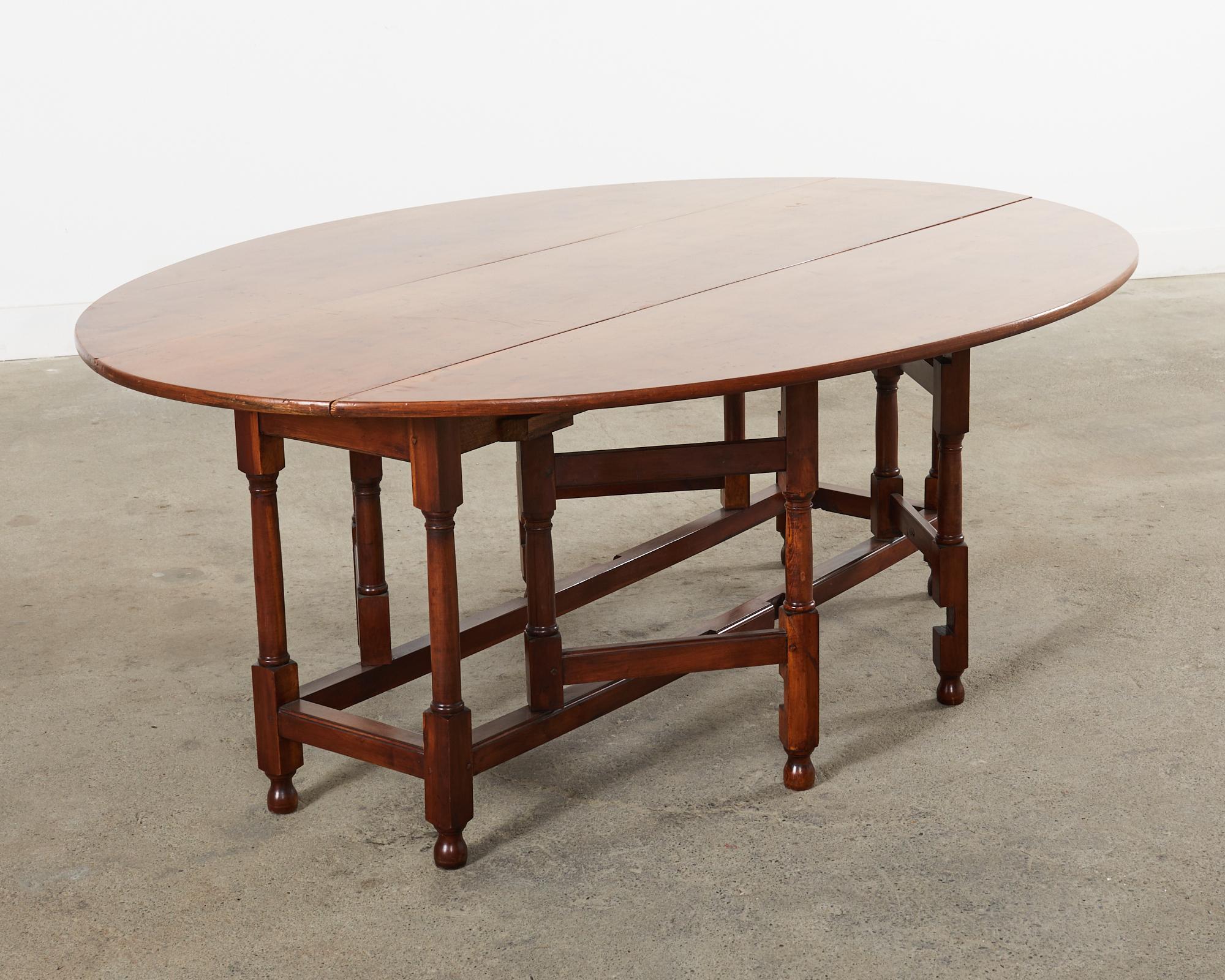 Dennis and Leen Georgian Style Drop-leaf Oval Dining Table  In Distressed Condition For Sale In Rio Vista, CA