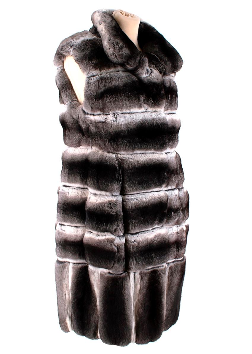 Dennis Basso Natural Chinchilla Fur Gilet

- Luxurious exceptional soft chinchilla fur texture
- Natural grey hues 
- Classic cut 
- Pockets to the sides 
- Silk satin lining 
- Concealed hook fastening to the front 
- Timeless elegant design
