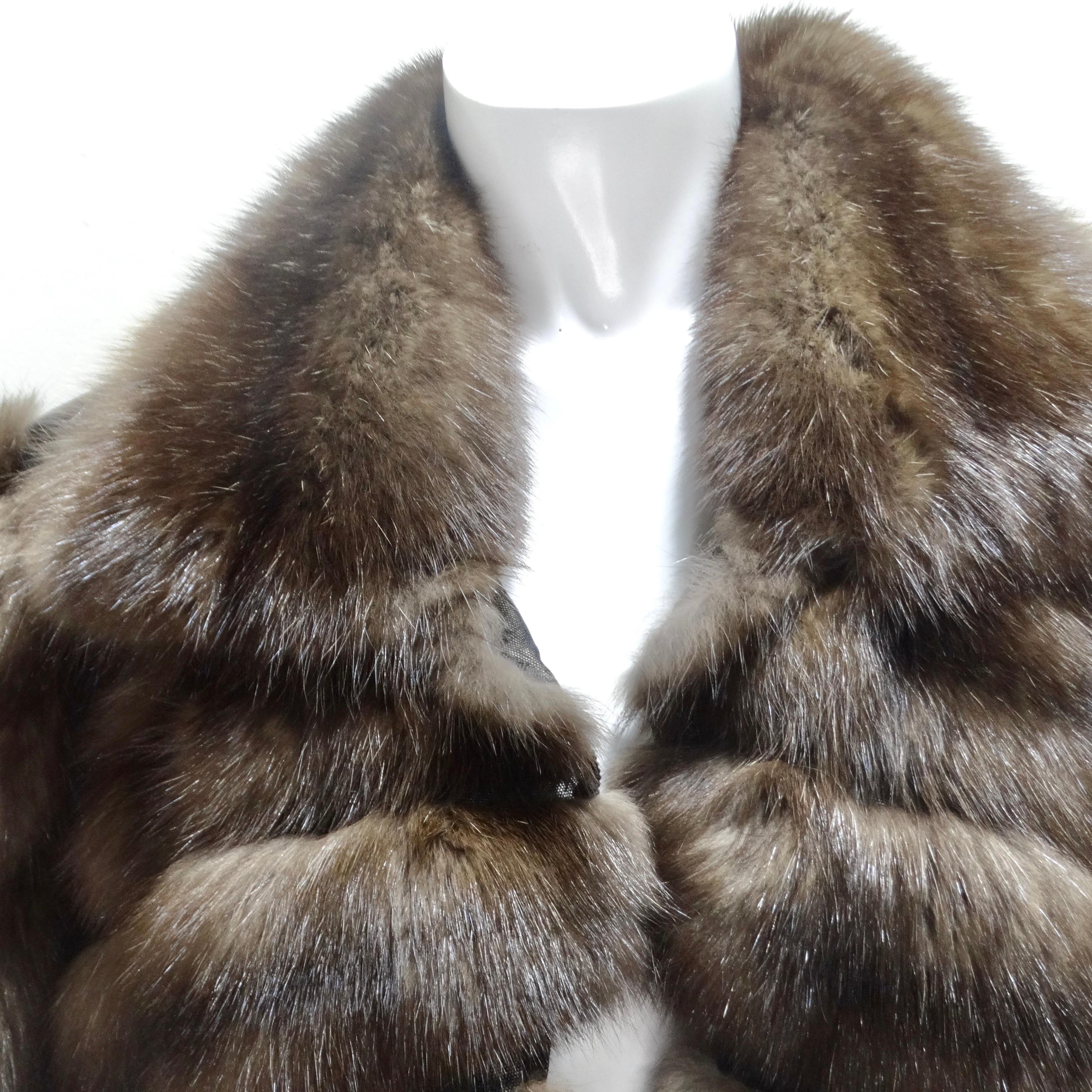 Introducing a cape that transcends fashion to become a symbol of opulence and timeless sophistication - the Dennis Basso Russian Sable Cropped Cape. This beautiful cropped cape features luxurious brown Russian sable fur complemented by hints of