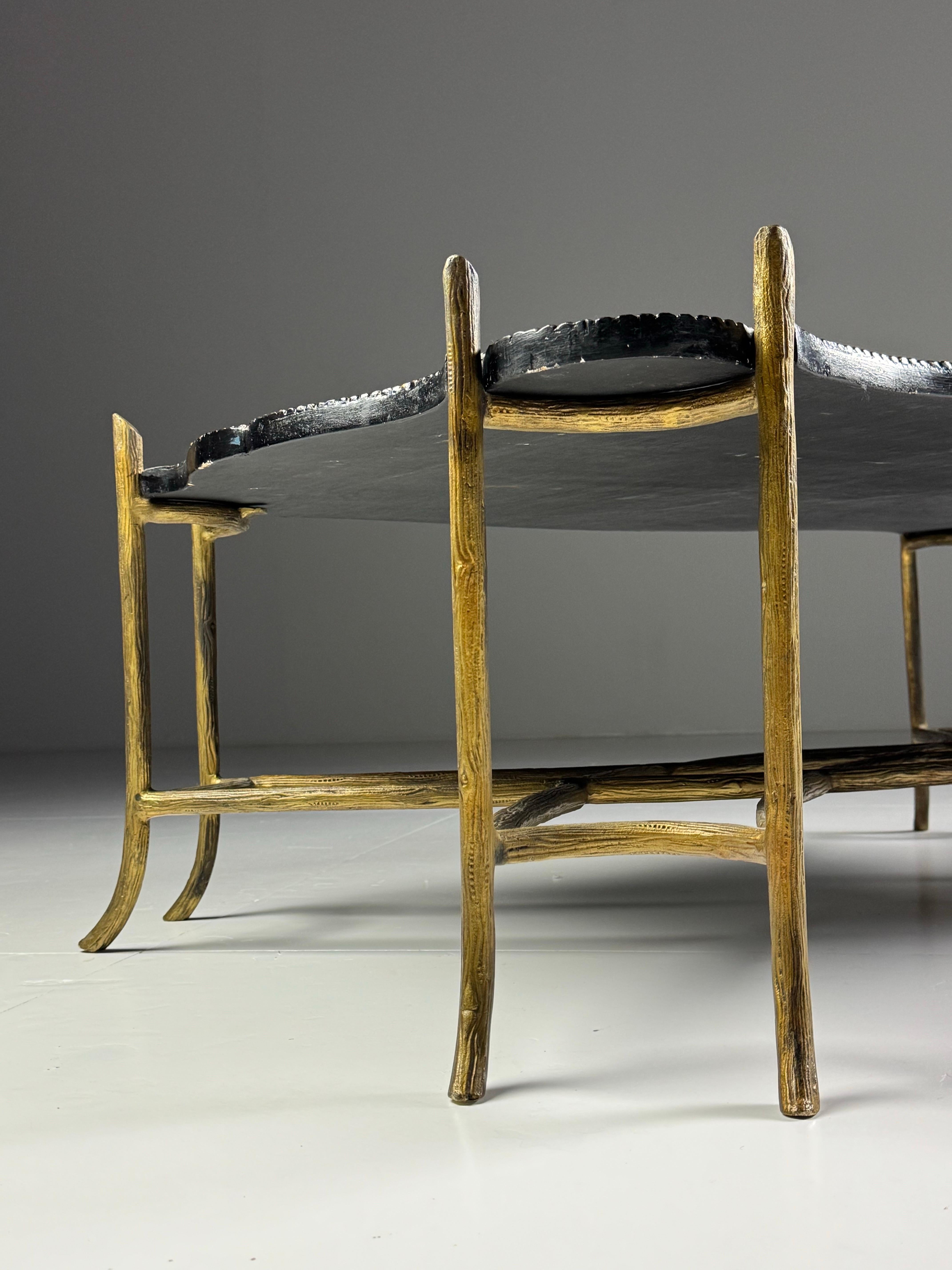 Vintage chinoiserie coffee table.

Large chinoiserie coffee table. Made by Dennis & Leen. Made in the 1980s. Metal frame with faux bois motif. Black top with chinoiserie details.

Dimensions: 126L x 84D x 45H cm