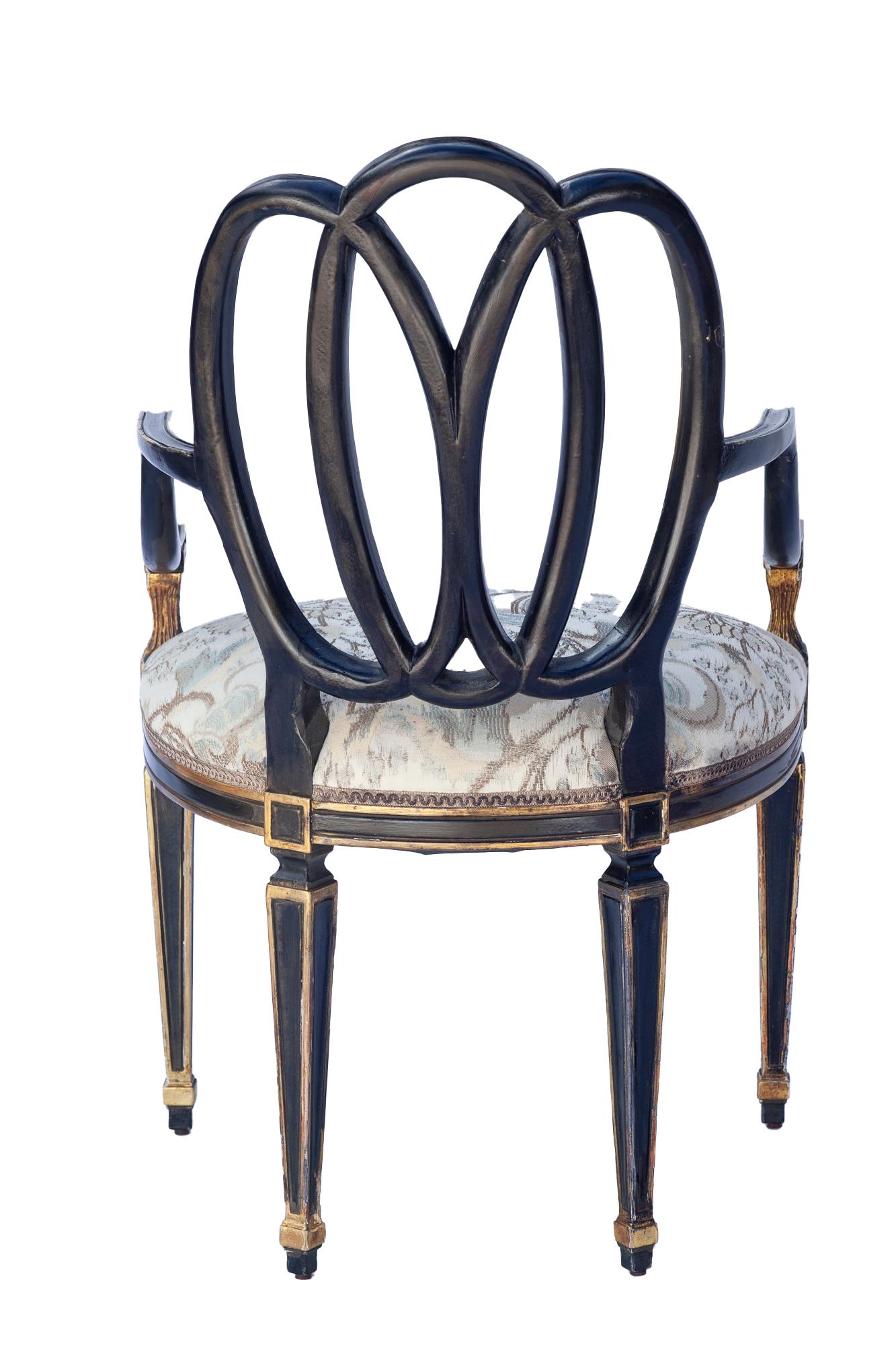 American Classical Dennis & Leen Ebonized and Parcel-Gilt Bracelet Armchairs; a pair