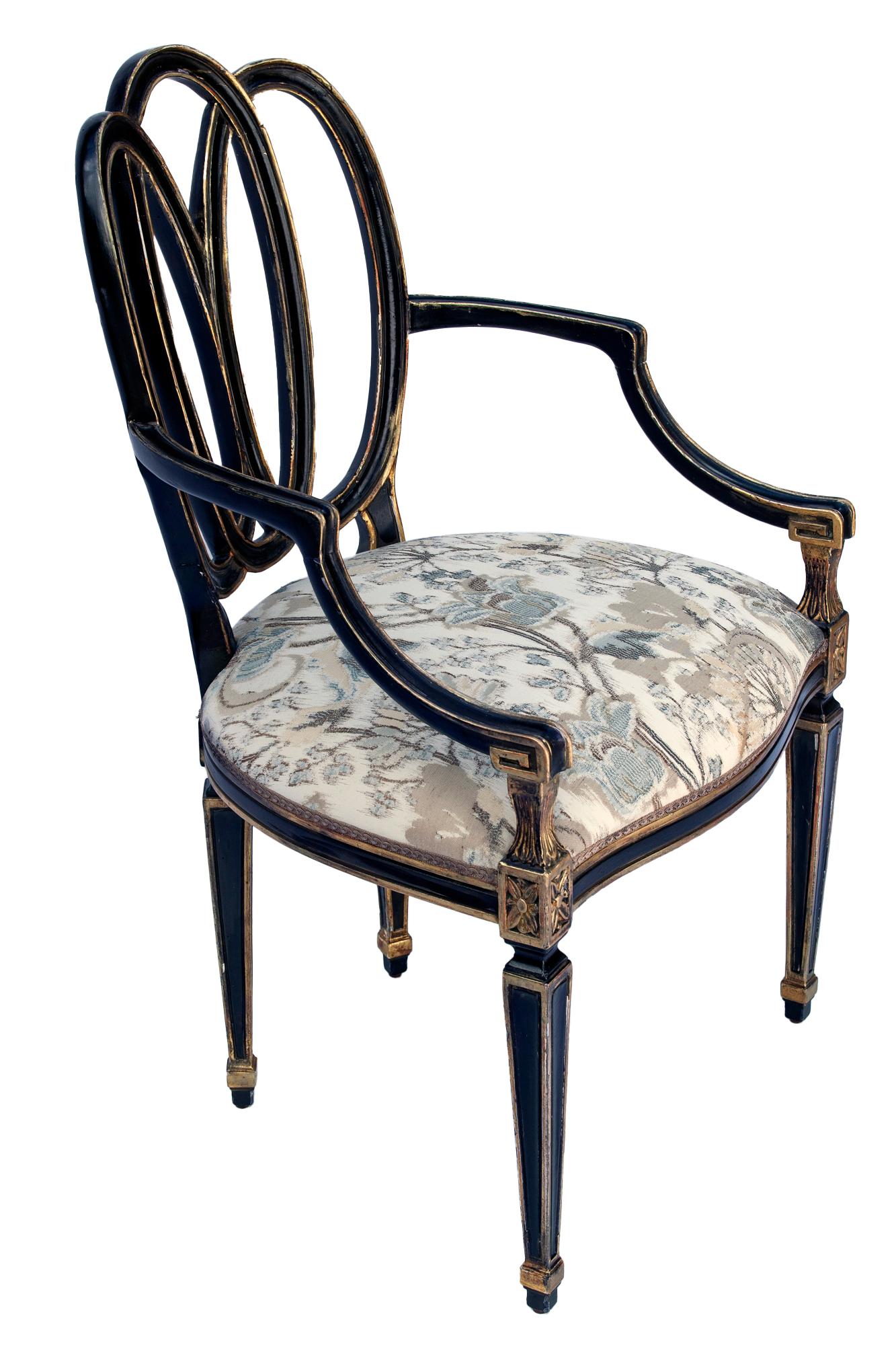 Giltwood Dennis & Leen Ebonized and Parcel-Gilt Bracelet Armchairs; a pair