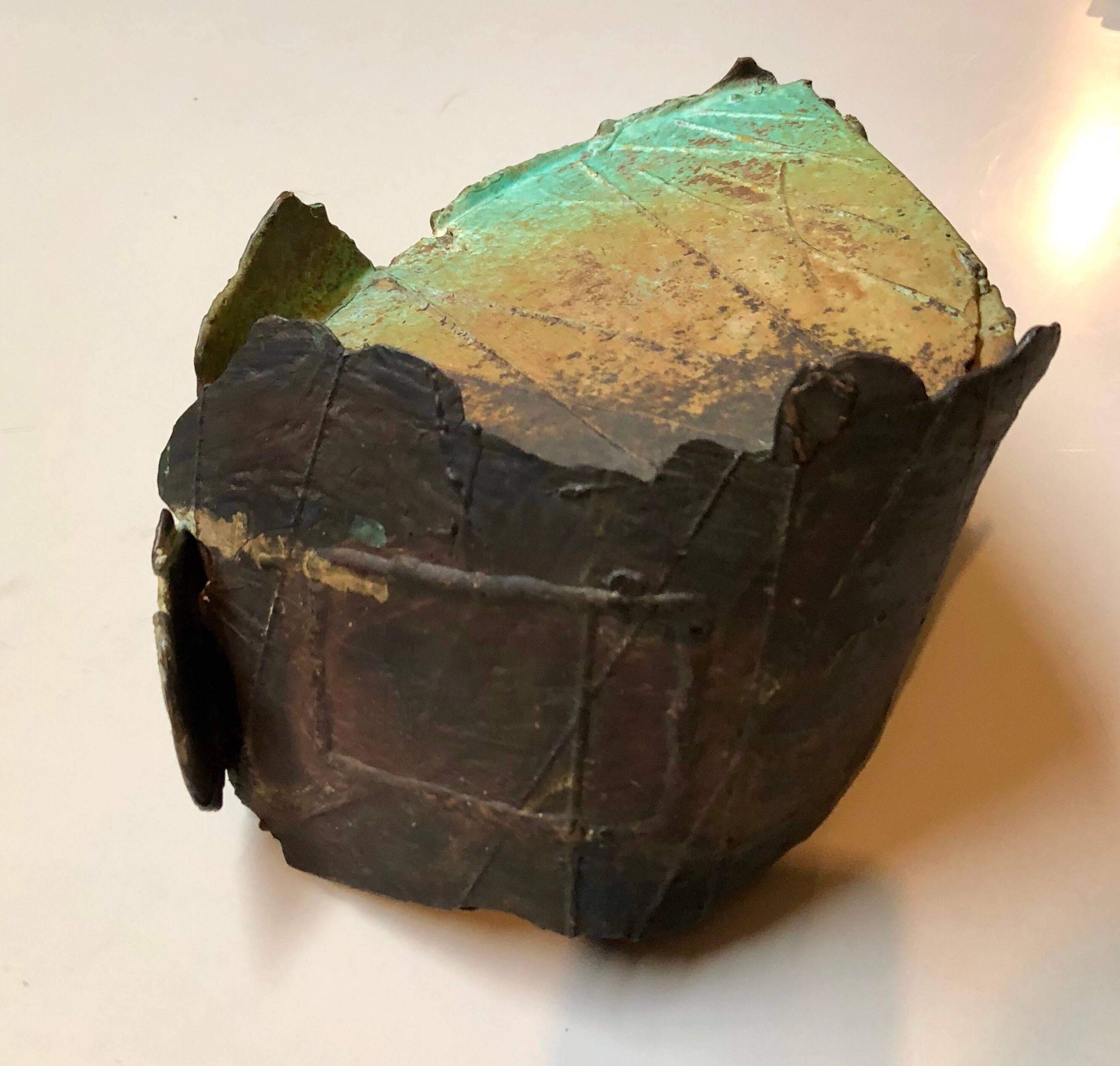 It has a variegated patina and texture to it. It does not appear to be signed. It was exhibited at Patricia Sweetow gallery in San Francisco.


Dennis Leon, was a San Francisco Bay Area sculptor and art instructor
Mr. Leon was chairman of the