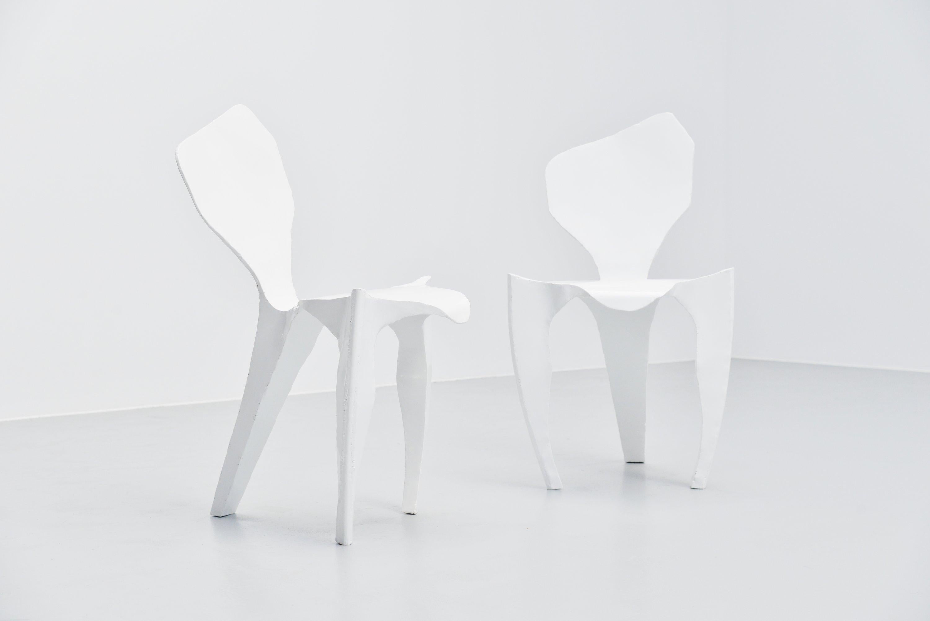 Stunning Brutalist metal side chairs designed by Dennis slootweg and produced in his own workshop, Holland 1998. The chair is made of metal, welded and white coated. Fantastic shaped chair, similarities with the work from Ron Arad. These chairs were