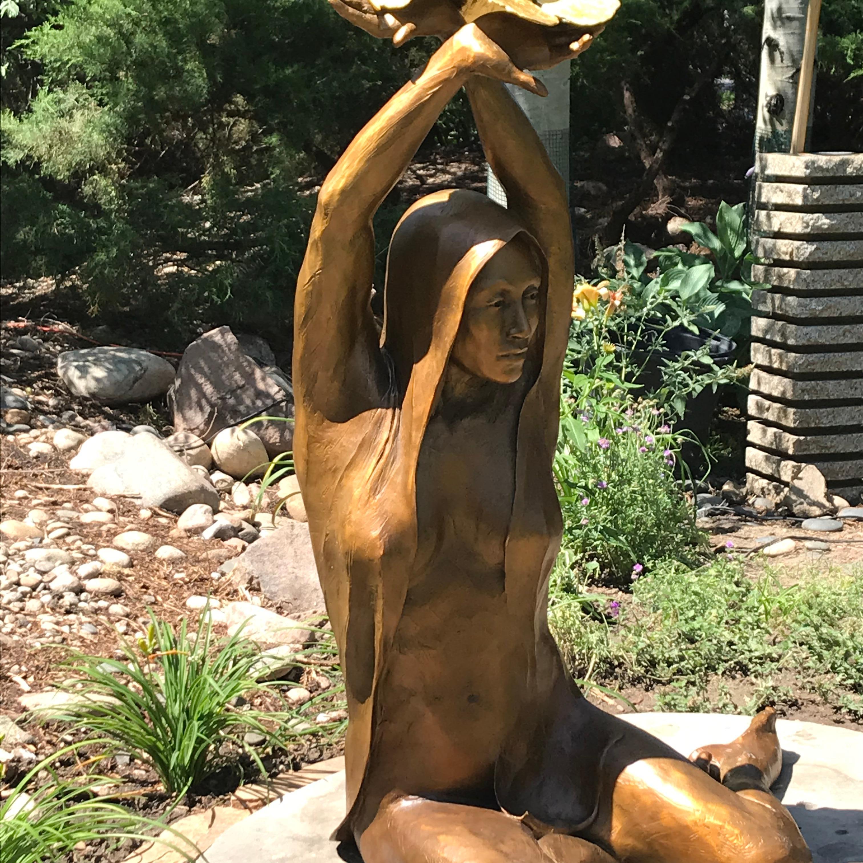 Transform by Denny Haskew
Figurative Bronze with Gold Leaf 5ft x 3ft x 2ft
Nude stretching her arms up to fluttering butterflies above her head.
Stone is not included. Shipping cost includes custom packing necessary for safe transport of fine