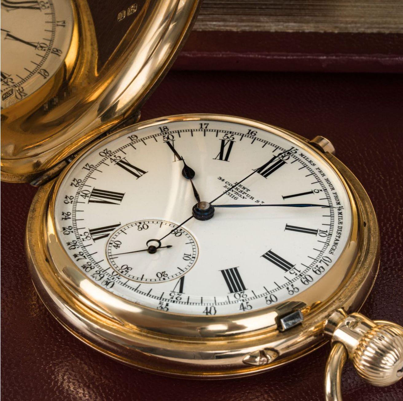 Dent. A Heavy 18ct Gold Keyless Lever Chronograph Full Hunter Pocket Watch C1900s

Dial: The rare white enamel dial fully signed Dent, 34 Cockspur Street London and numbered with Roman Numerals, outer early tachymeter track for racing and written