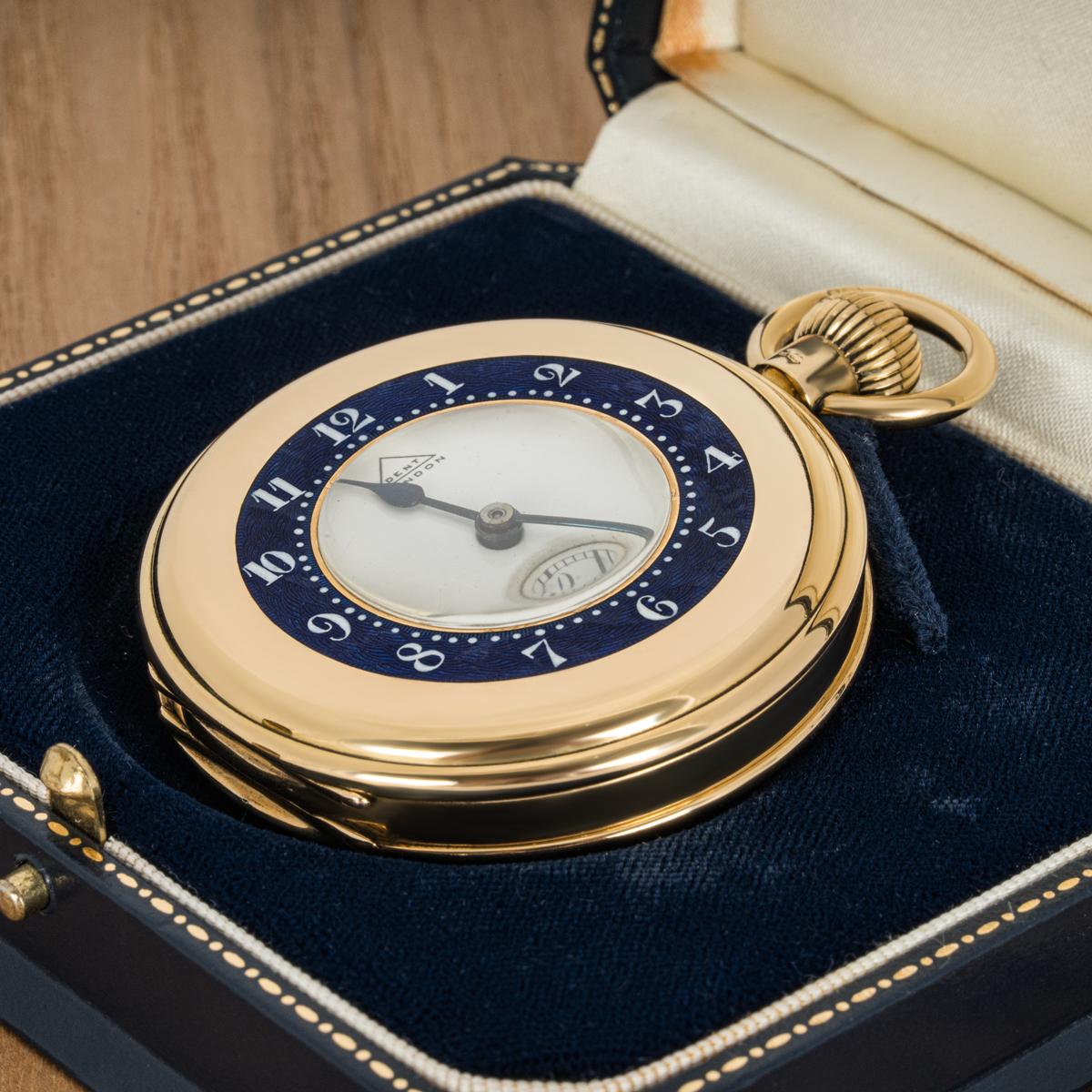 Dent London. A Rare and Important 18ct Yellow Gold Half Hunter Keyless Lever Pocket Watch C1906

Dial: The beautiful white enamel dial signed Dent in a triangle London with Roman Numerals outer minute track, subsidiary seconds dial at six o' clock