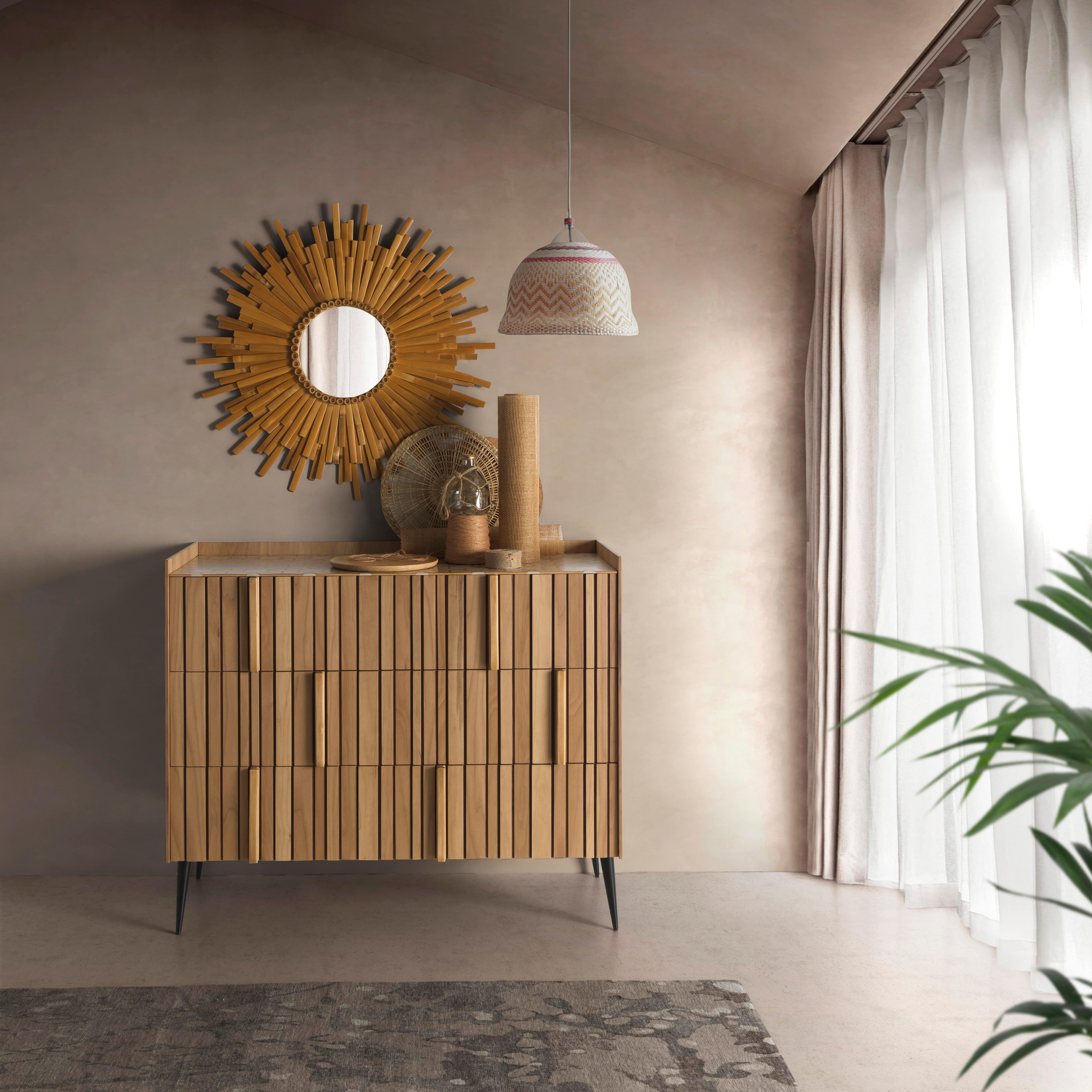 Denver Chest Of Drawers by Lola Glamour
Dimensions: D 45 x W 120 x H 100 cm
Materials: Walnut wood, iron.

Made of walnut wood, it is a smooth box that houses a slatted and irregular front that can hide doors or drawers. Above it, a lowered
