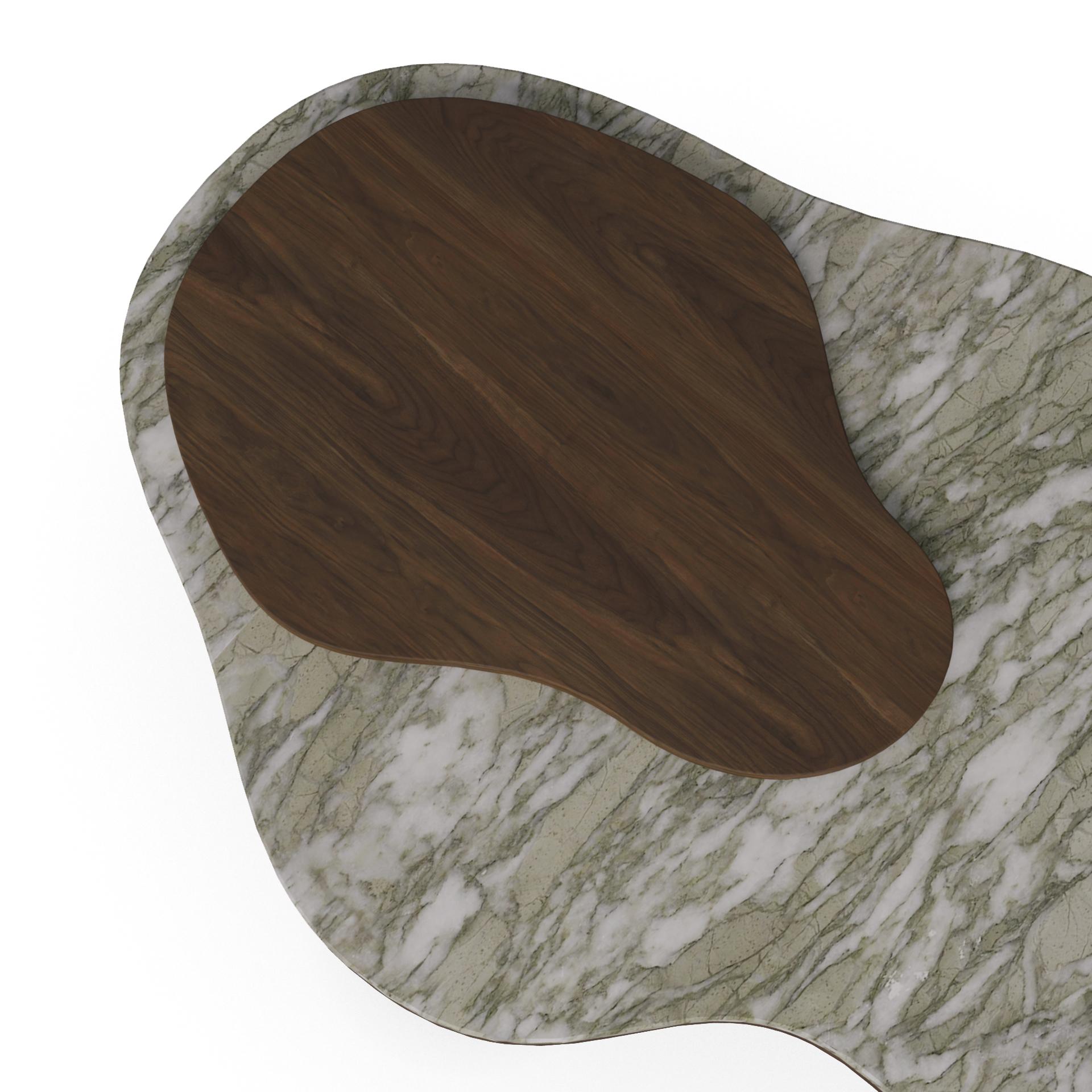 La table basse Deolin est une table basse en marbre vert persan, conçue comme un volume sculptural qui ancre une zone d'assise avec une présence mesurée. Sa clarté géométrique équilibre la richesse des matériaux et le calme de l'espace. La surface