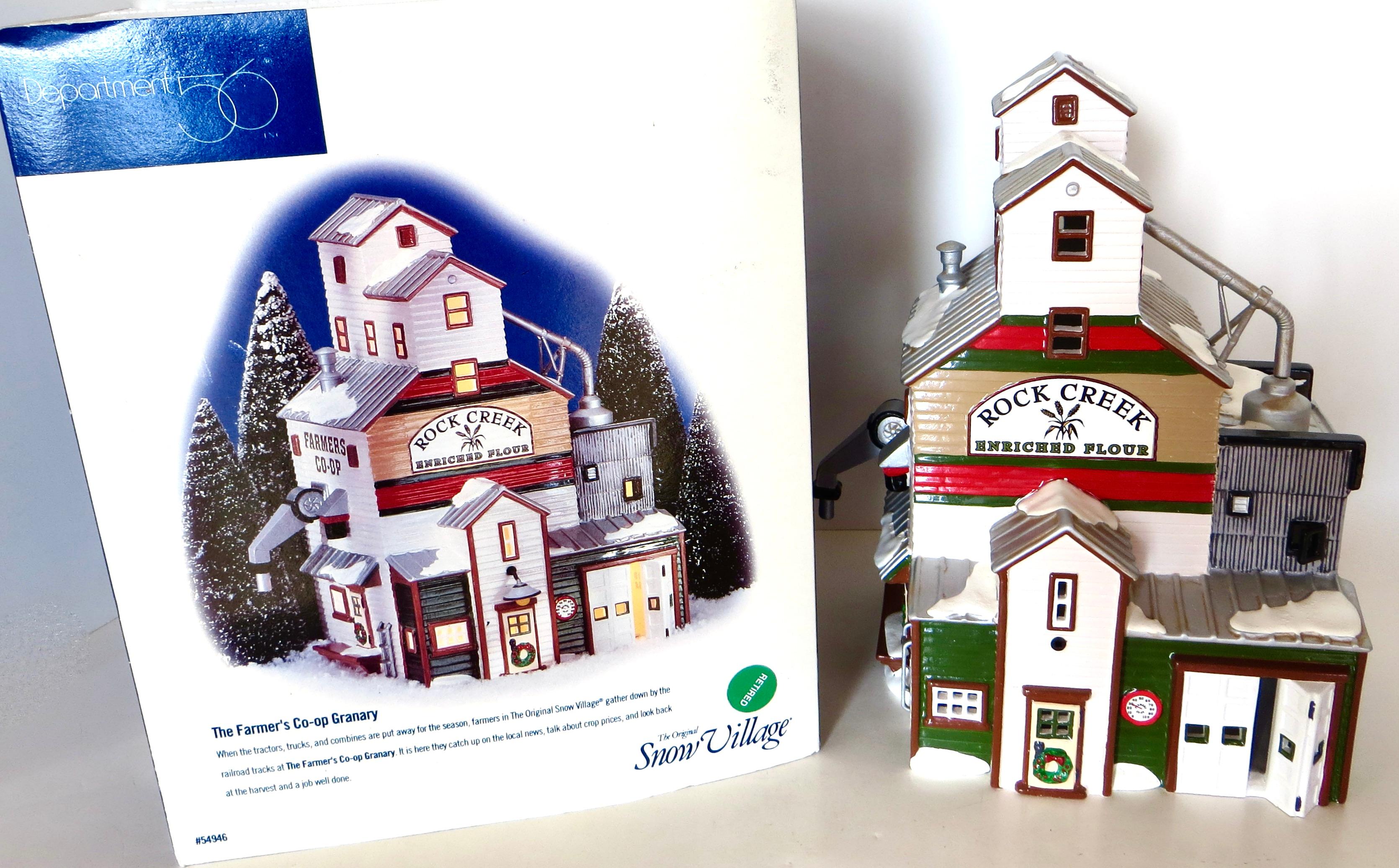 Offered are (3) highly collectible Department 56 Christmas Village items. 
1) 