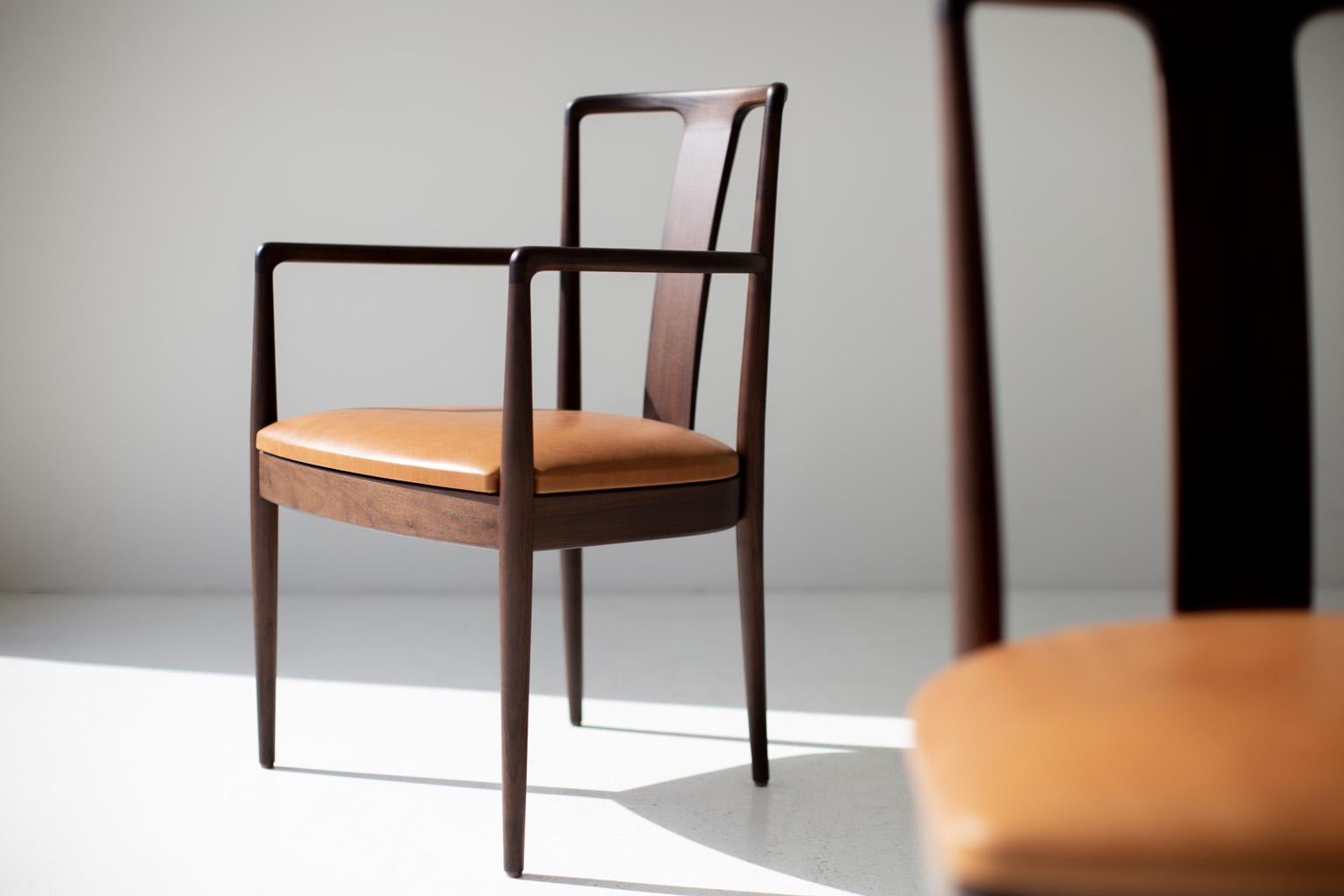 Derby Dining Chairs, Modern Dining Arm Chair, Peabody, Walnut, Leather, Craft Associates

These modern wood dining arm chair by Lawrence Peabody : The Derby Chair for Craft Associates Furniture are expertly hand crafted and upholstered. These