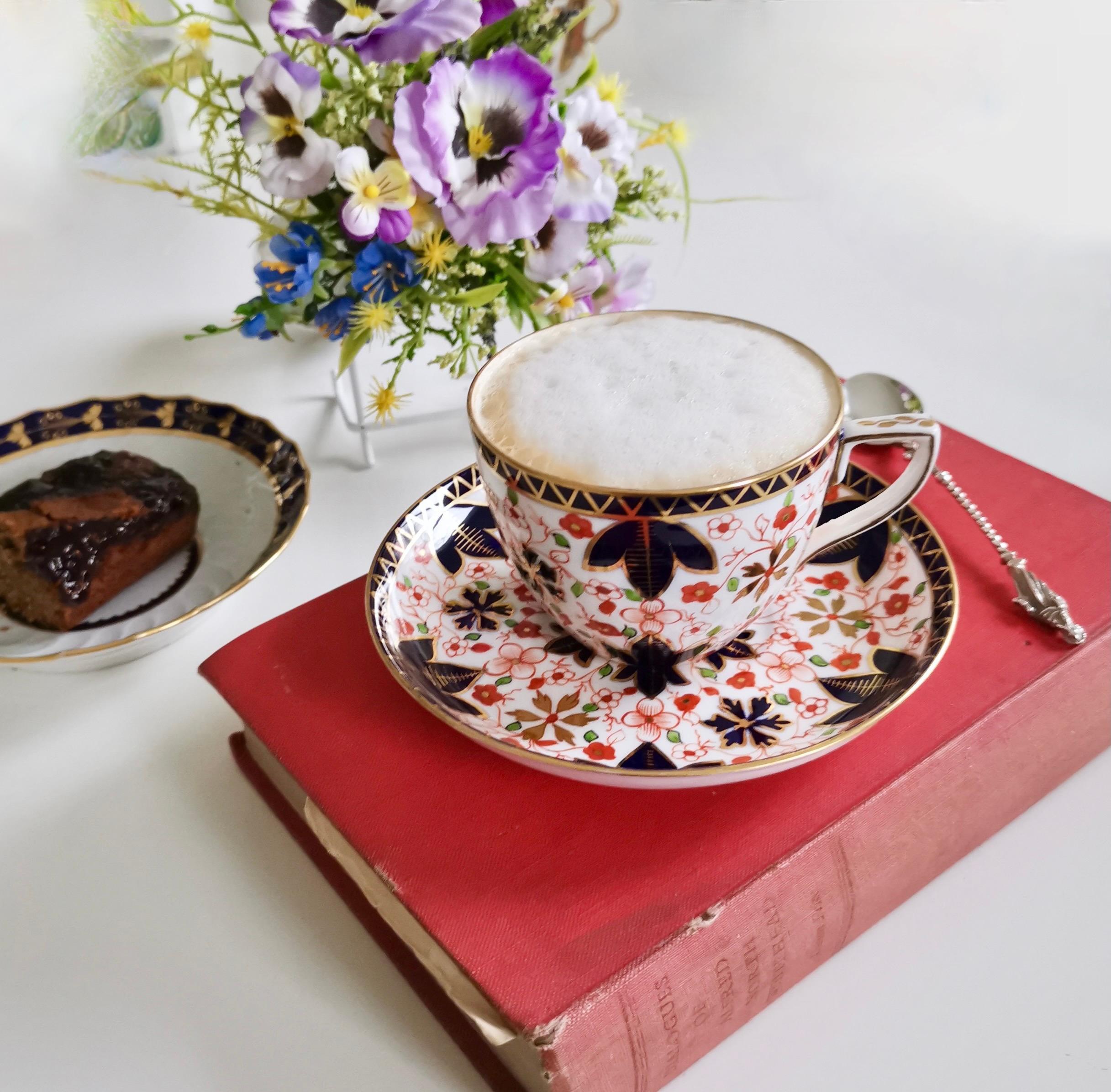 This is a charming teacup and saucer made by the Derby King Street factory in 1889. The set is decorated with a striking Imari pattern, which is characteristic for the Derby factory.
 
The Derby Porcelain Company became very famous for its top