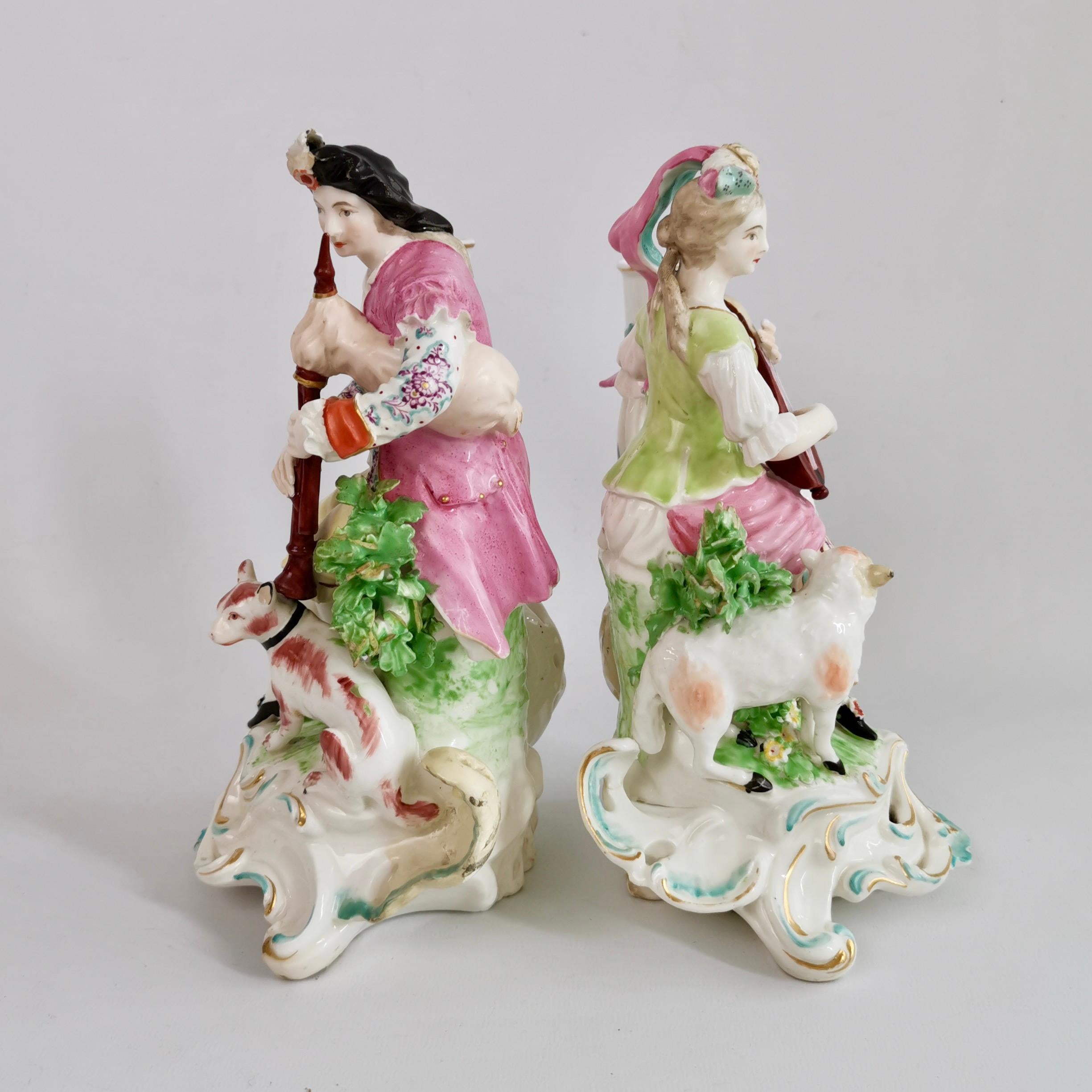 Hand-Painted Derby Pair of Candle Stick Figures, Bagpiper and Lady with Lute, Rococo, Ca 1765 For Sale