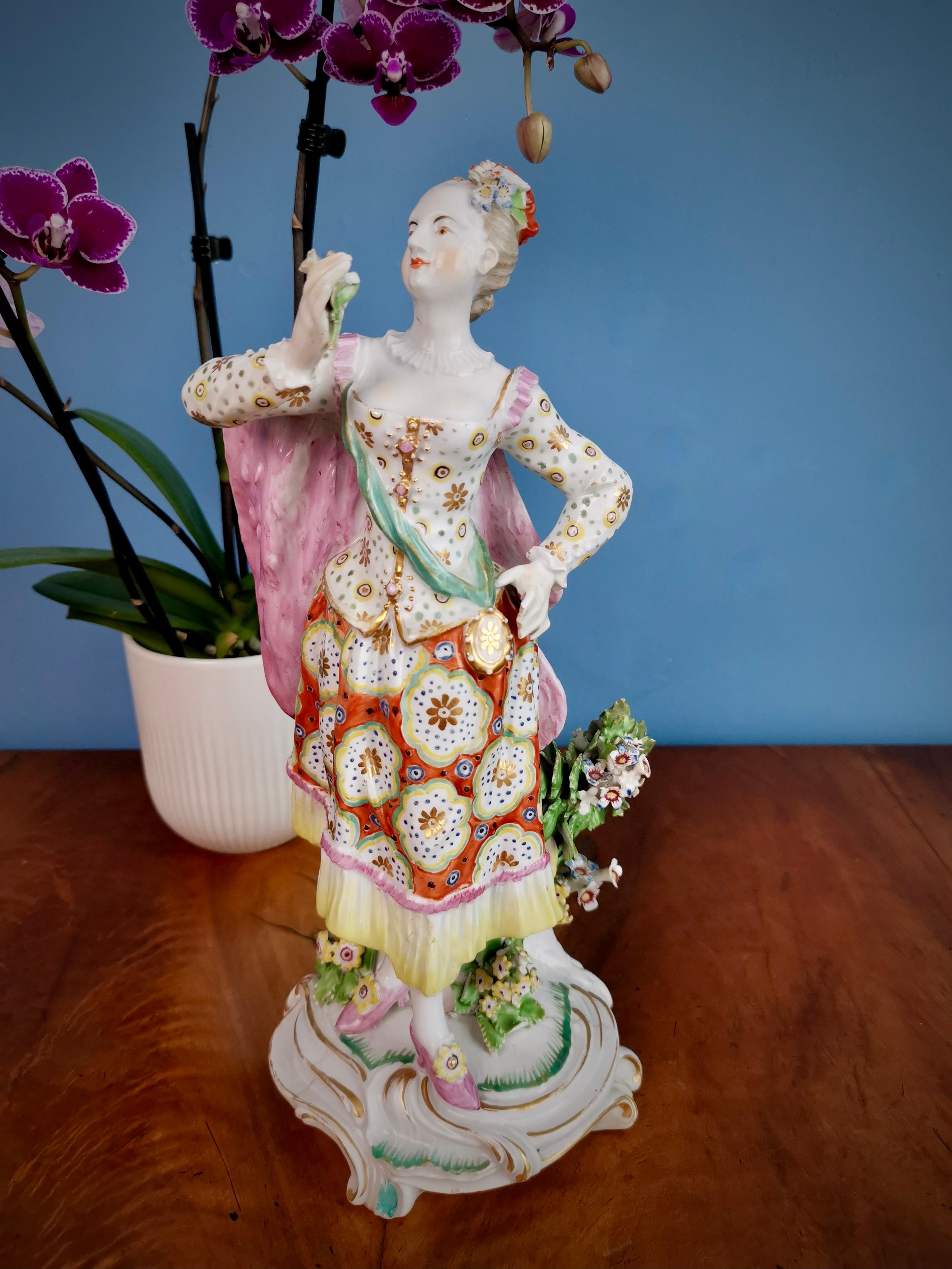 This is a sublimely made porcelain figure of the female 