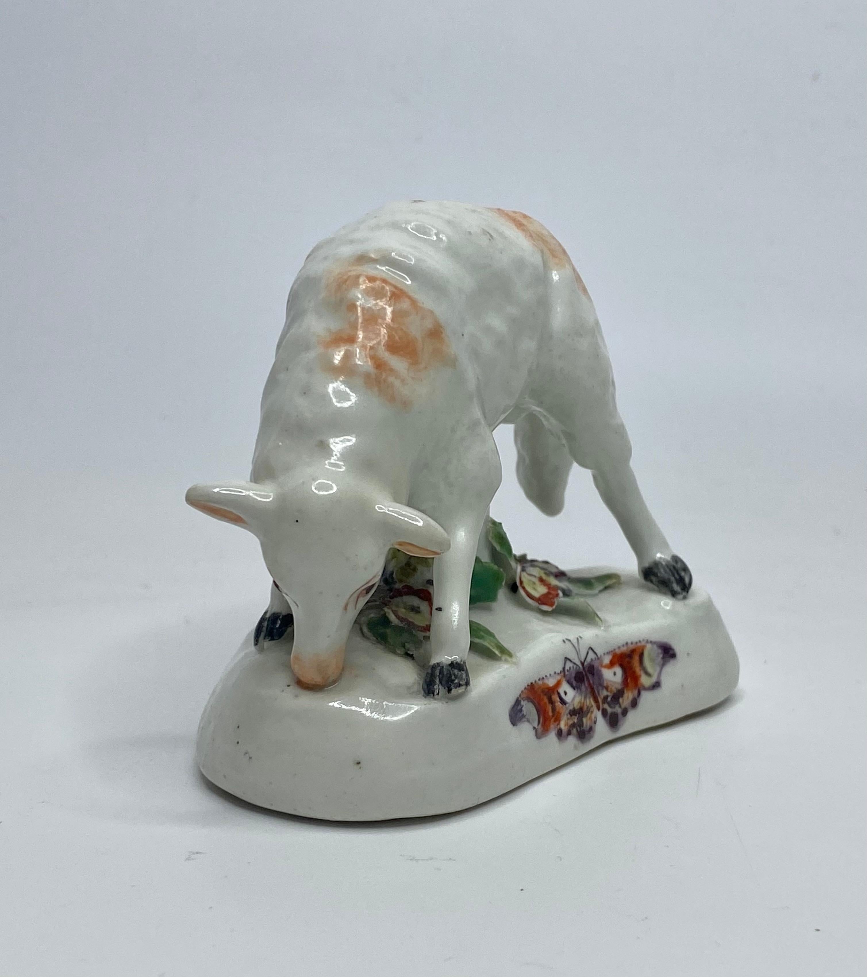 A rare Derby porcelain figure of a sheep, c. 1760. The finely modelled sheep, grazing amongst a flower strewn base, and painted with liver coloured spots.
Unusually, the base is hand painted, in vibrant enamels, with a large butterfly.
Three ‘Patch’