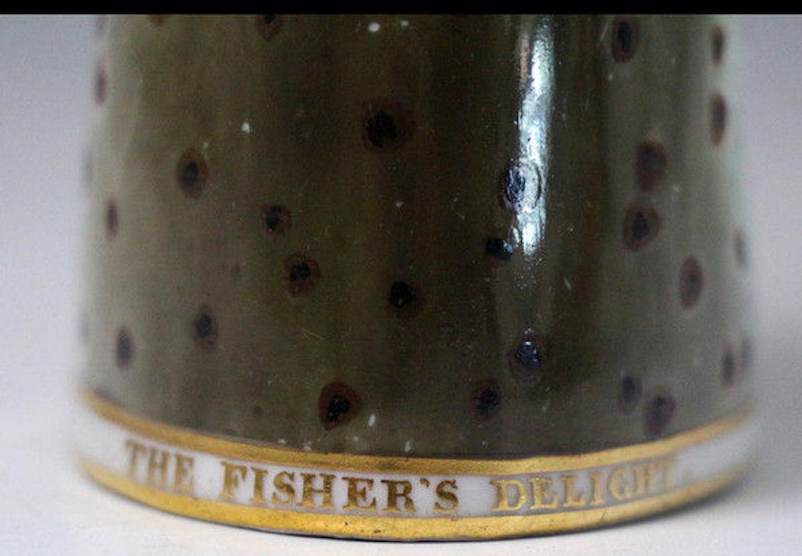 Dated: circa 1810 Derby England

Antique English porcelain salmon head stirrup cup Derby circa 1810 