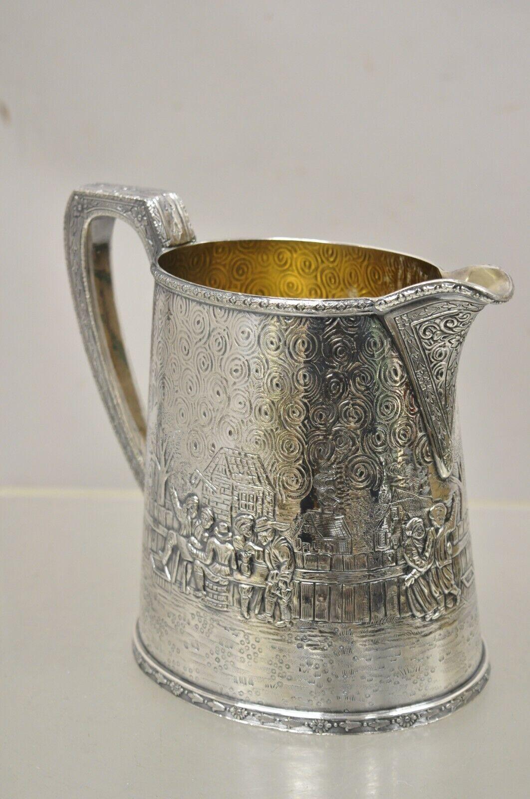 Derby S.P. Co International Figural Repousse Village Silverplate Water Pitcher For Sale 3