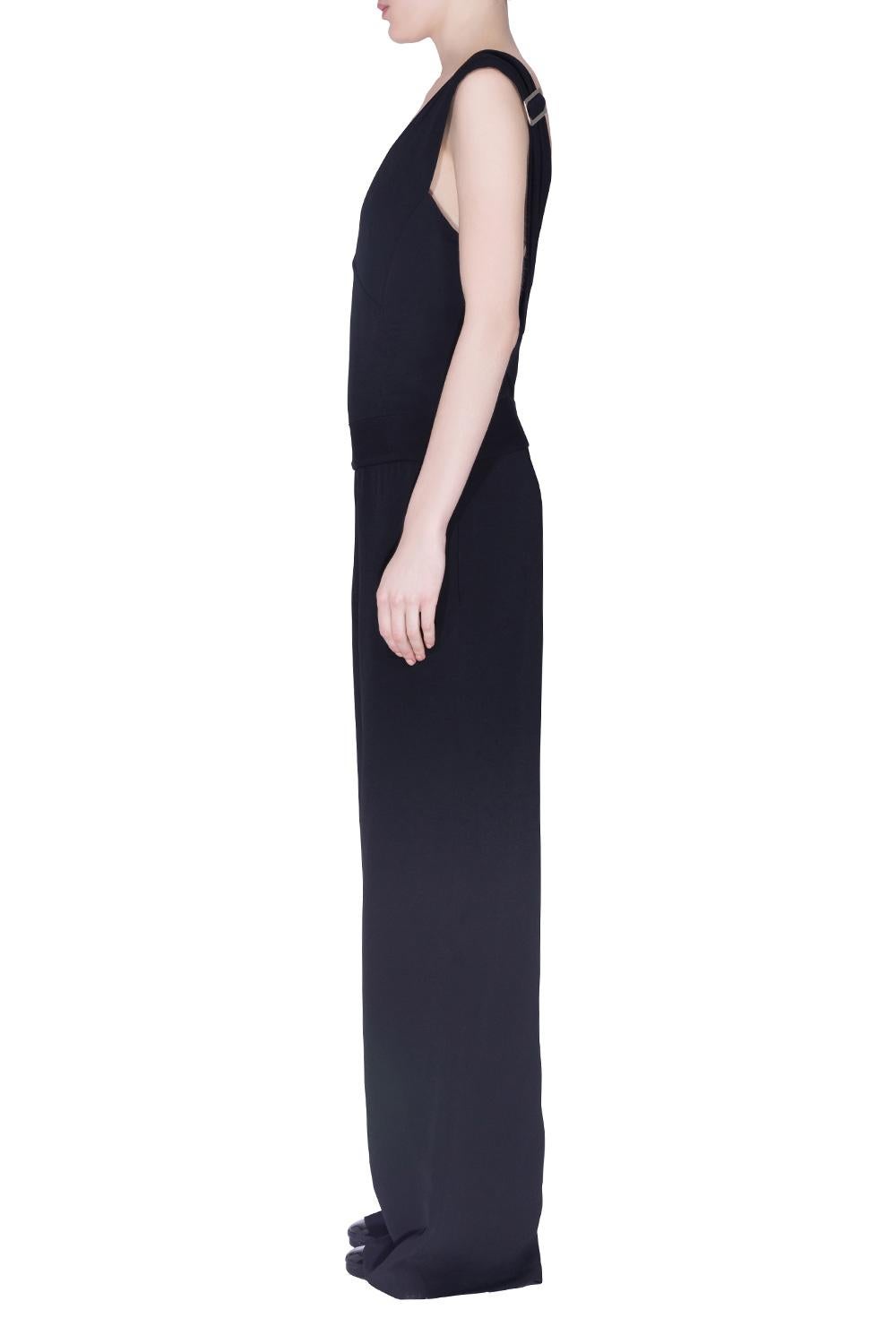 Derek Lam has made this fabulous jumpsuit from fine black fabric. The piece features a plunging neckline with buckle detail on the shoulders. The sleeveless jumpsuit will be your perfect choice for evening outings, all you need is just the right