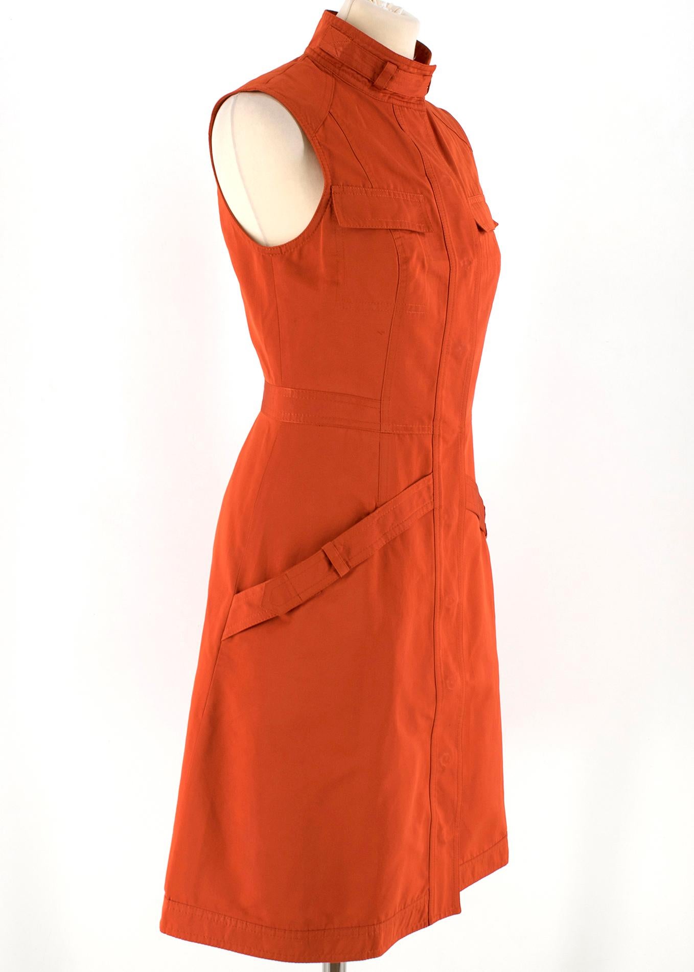 Derek Lam Brick Orange Sleeveless Utility Dress

- This timeless classic dress from Derek Lam is a fantastic piece 
- This is made from 60% Polyester and 40% Cotton
- This sleeveless style features a single breasted buttoned fastening and handy