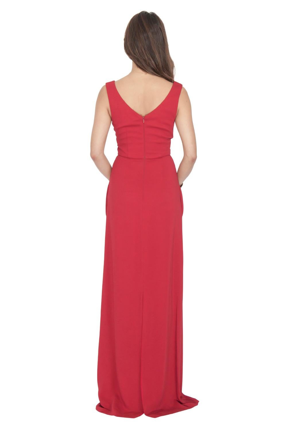 Designed with a criss-cross pleated bodice, this sleeveless gown comes in red color. Walk like a diva in this brilliant creation tailored from a fine fabric blend. Derek Lam has precisely made this gown to complement your personality in the most