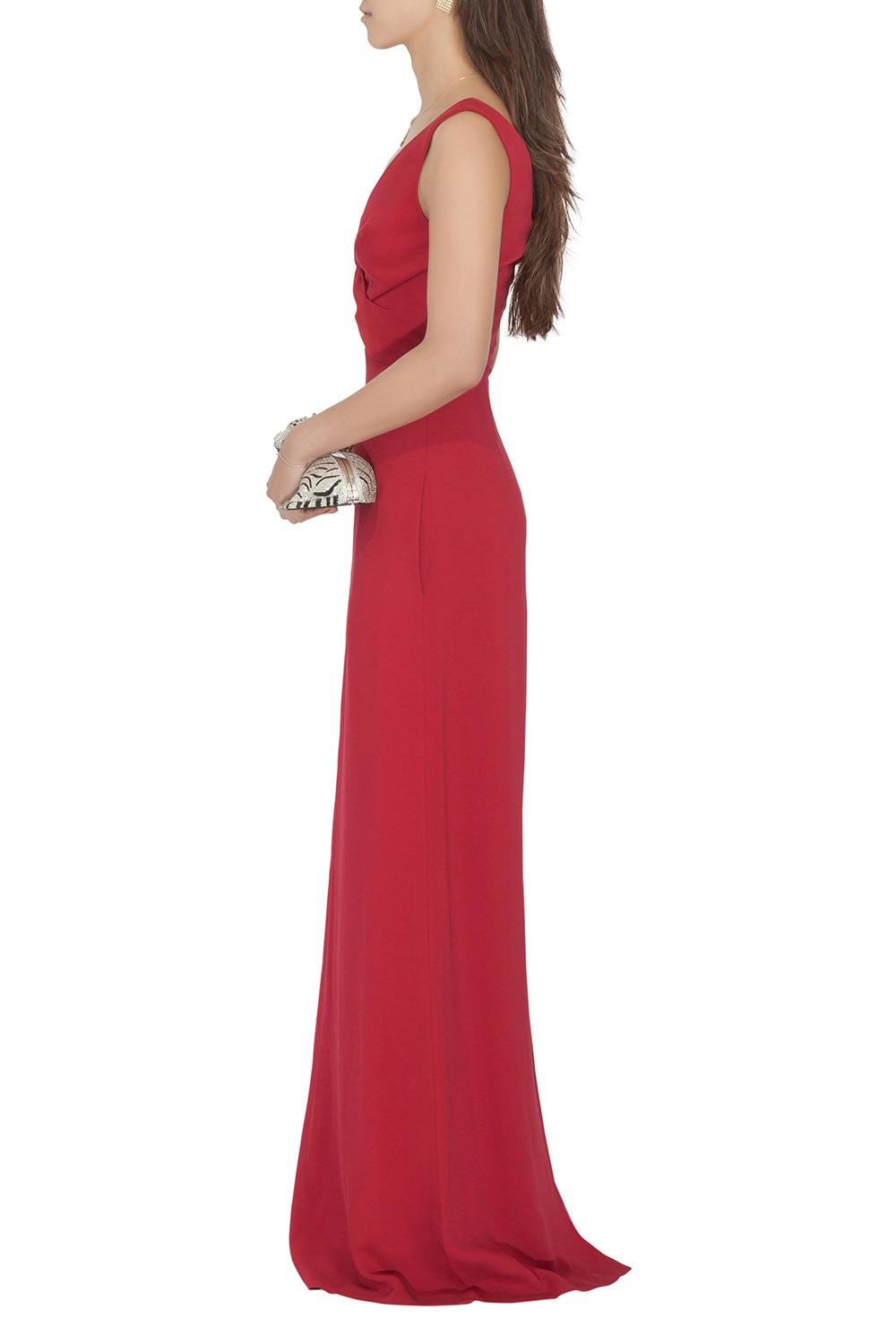 Designed with a criss-cross pleated bodice, this sleeveless gown comes in red color. Walk like a diva in this brilliant creation tailored from a fine fabric blend. Derek Lam has precisely made this gown to complement your personality in the most
