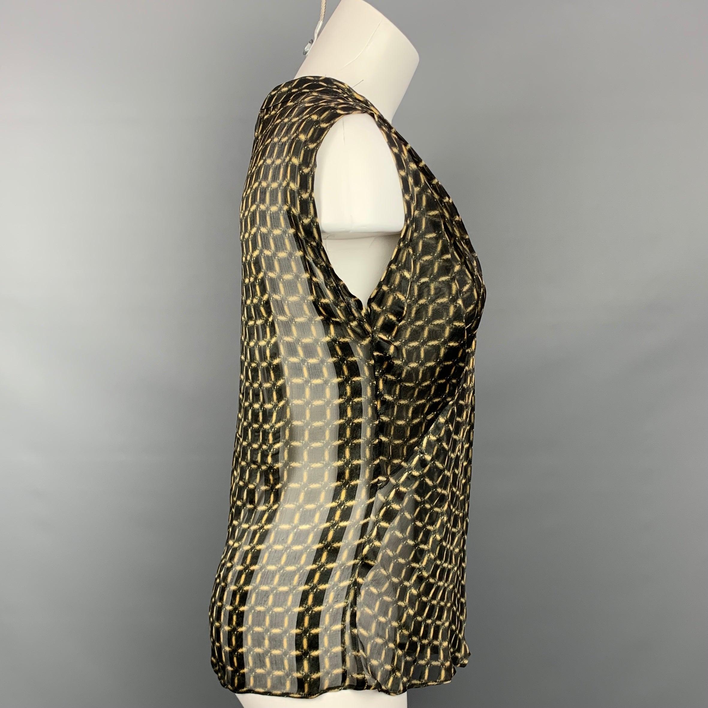 DEREK LAM blouse comes in a black & gold windowpane silk featuring no sleeves and a drape style.
Very Good
Pre-Owned Condition. 

Marked:   I 36 / F 32 / GB 4 / US 0 

Measurements: 
 
Shoulder: 16 inches  Bust: 34 inches  Length: 23 inches 
  
  
