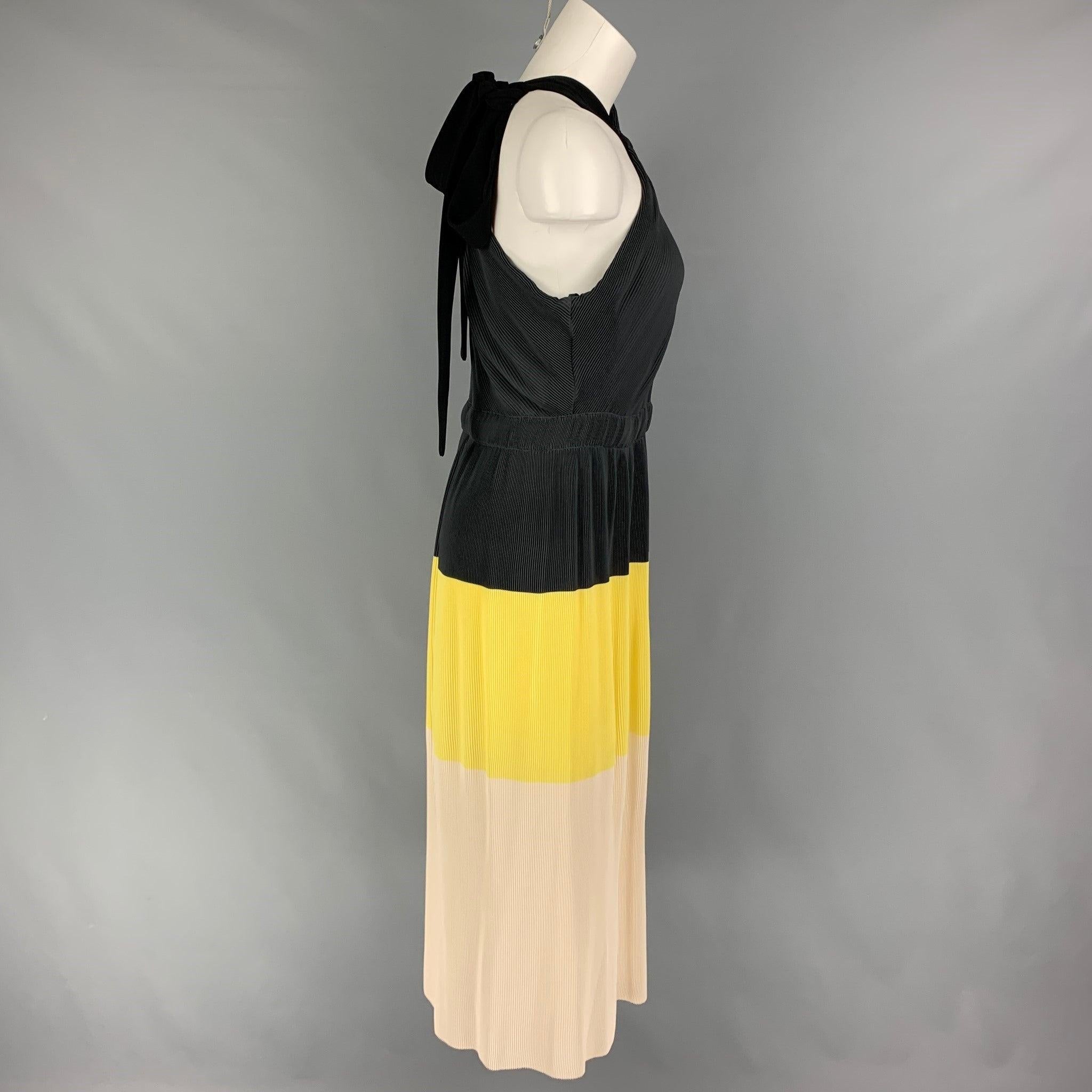 DEREK LAM dress comes in a multi-color pleated polyester featuring a one shoulder style, elastic waist, self-tie shoulder detail, and a side zipper closure.
Very Good
Pre-Owned Condition. 

Marked:   8 

Measurements: 
  Bust:
32 inches  Waist: 28