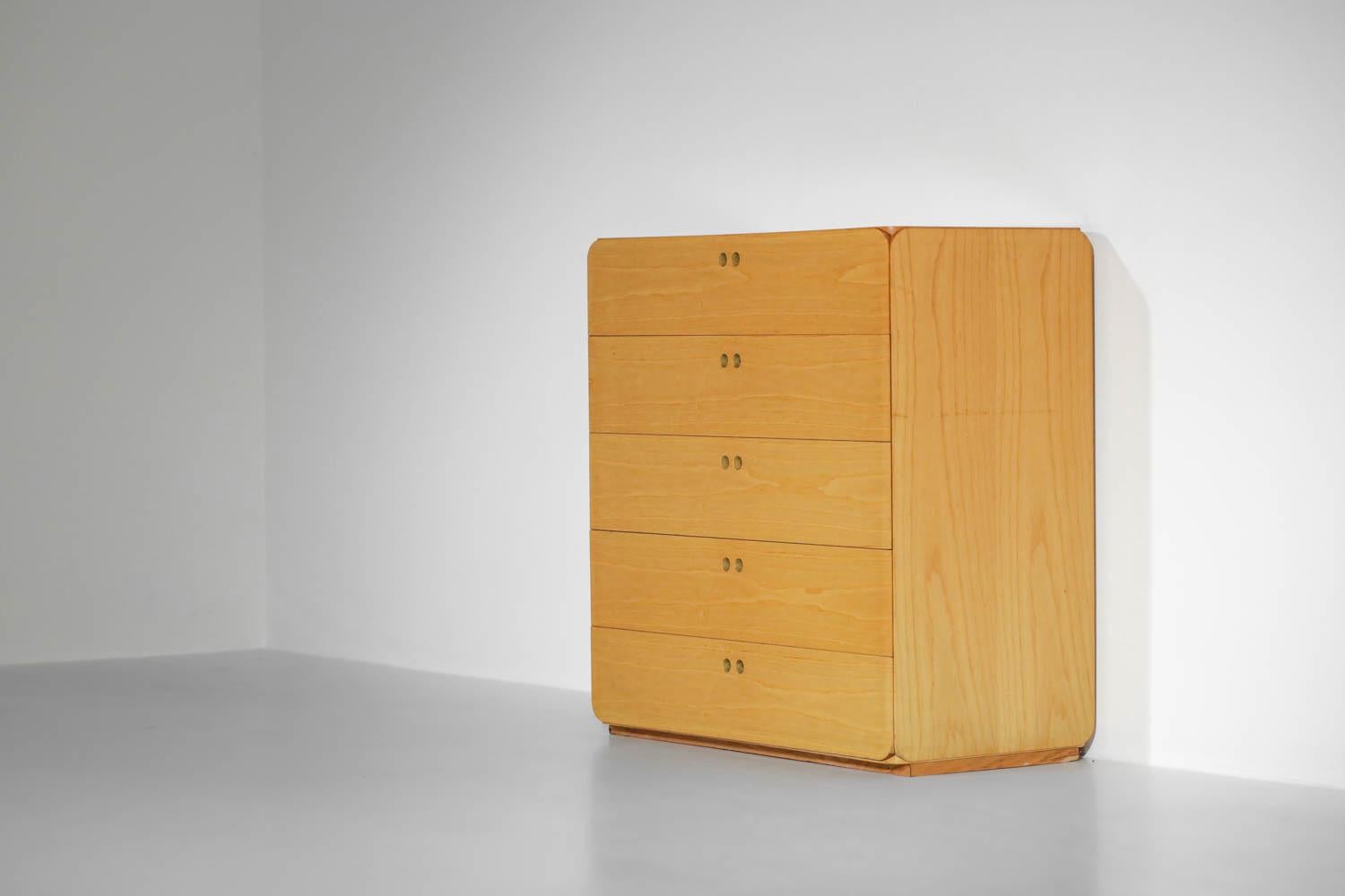 Dutch vintage bookcase from the 70's / 80's by designer Drek Jan de Vries. This bookcase is in two independent parts: the upper part with the showcase and the lower part like a chest of drawers with five drawers. The whole is made of solid beech and