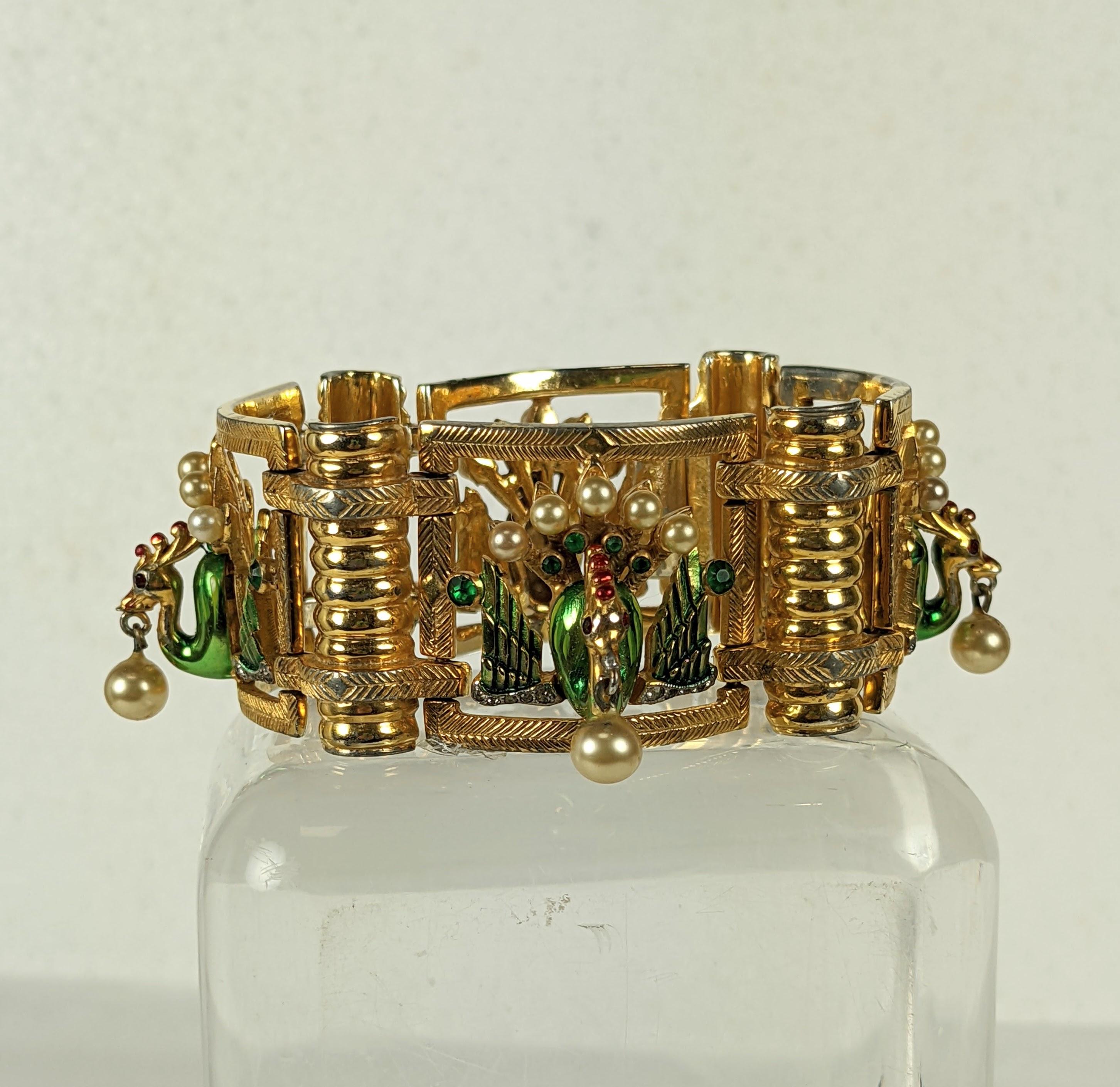 Rare and Incredible DeRosa Rare Anglo Indian Peacock Retro link bracelet.  Composed  of 4 three dimensional figural peacock links with four ribbed and incised links and signature iridescent green cold enamel. Each peacock motif is adorned with faux