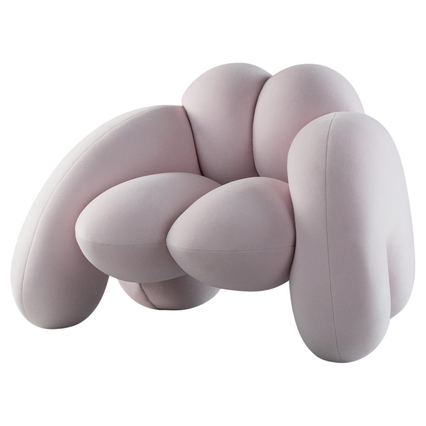 Part of the Peaches collection, the Derriere armchair conveys aspects of the female figure. The pieces are composed of a wood structure made up of 6 symmetrical pieces with the addition of a foam layer to create the large shapely surfaces. The