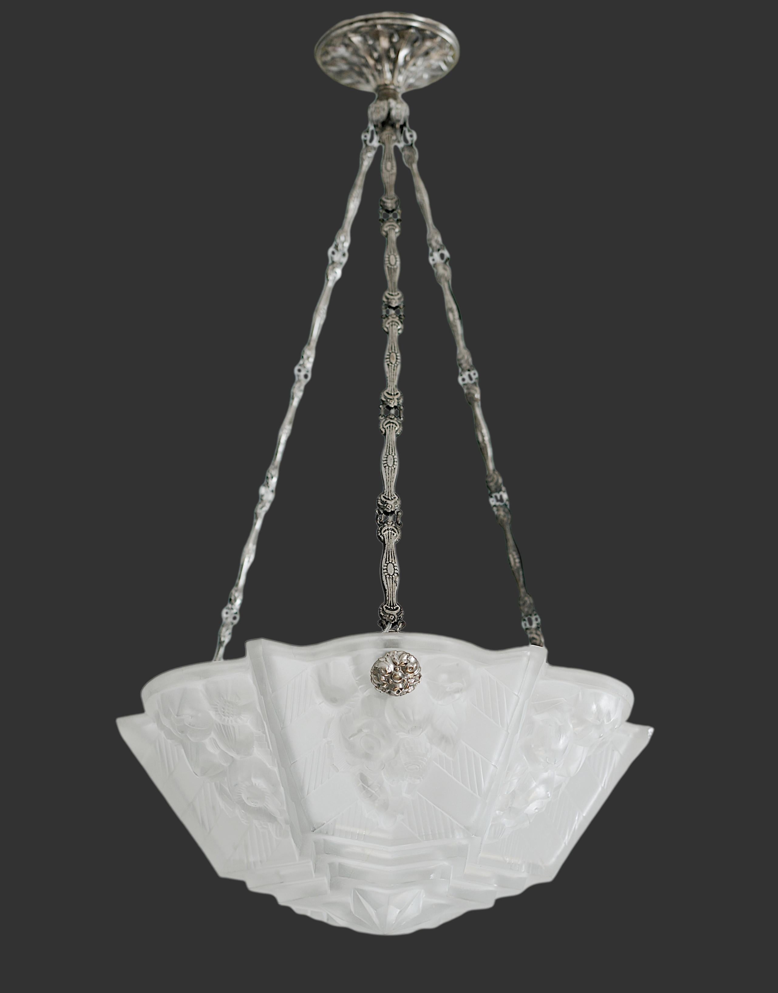 French Art Deco pendant chandelier by by VERRERIE DES HANOTS (Les Andelys), France, ca.1920. Thick molded glass shade. Silverplated stamped brass fixture. Height: 28