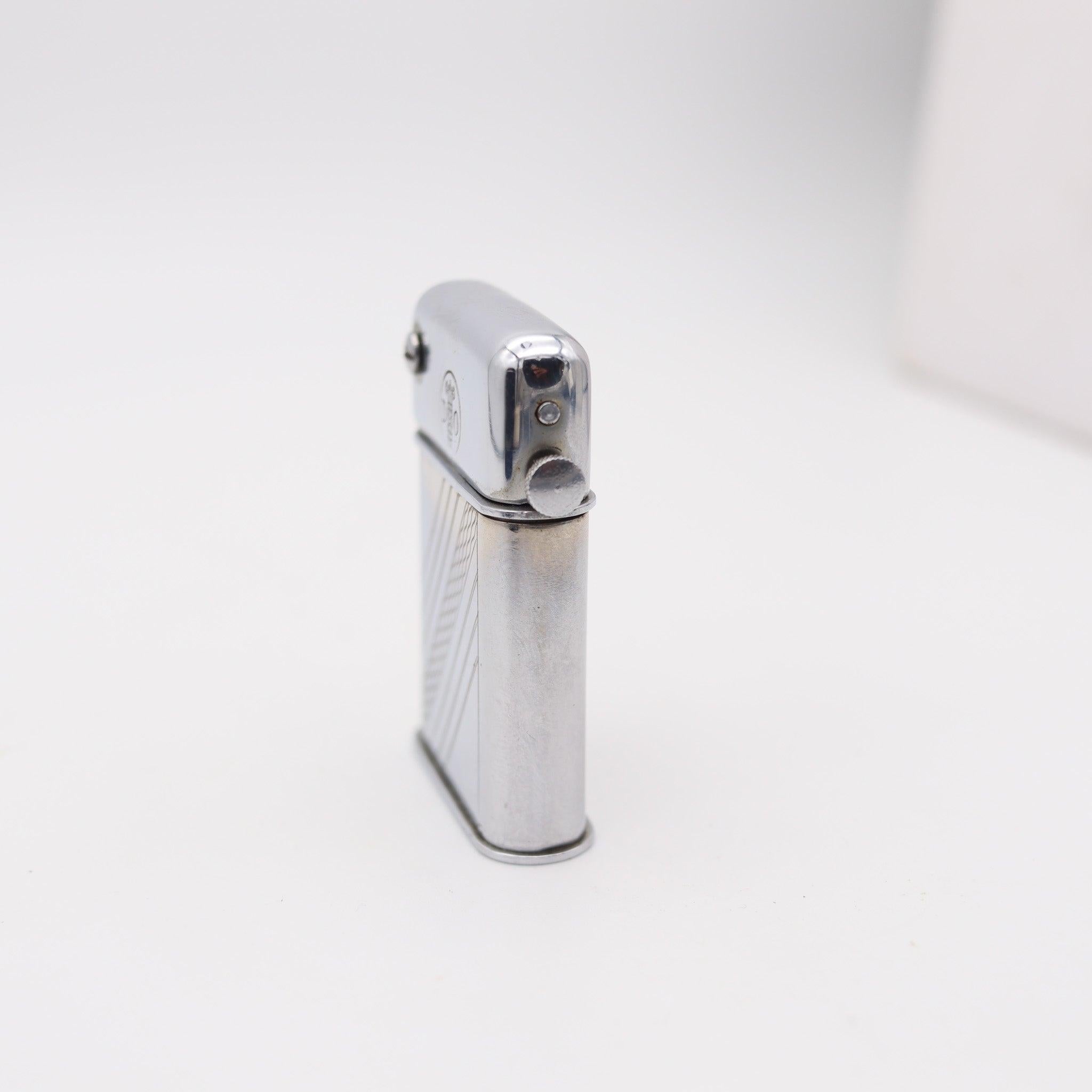 A Desarmeaux DO petrol lighter made in France.

This is a beautiful and rare antique pocket petrol lighter made in Saint Etienne France during the Art Deco period, back in 1931-1932. The lighter was designed by Louis-Marcel Desarmeaux masterfully