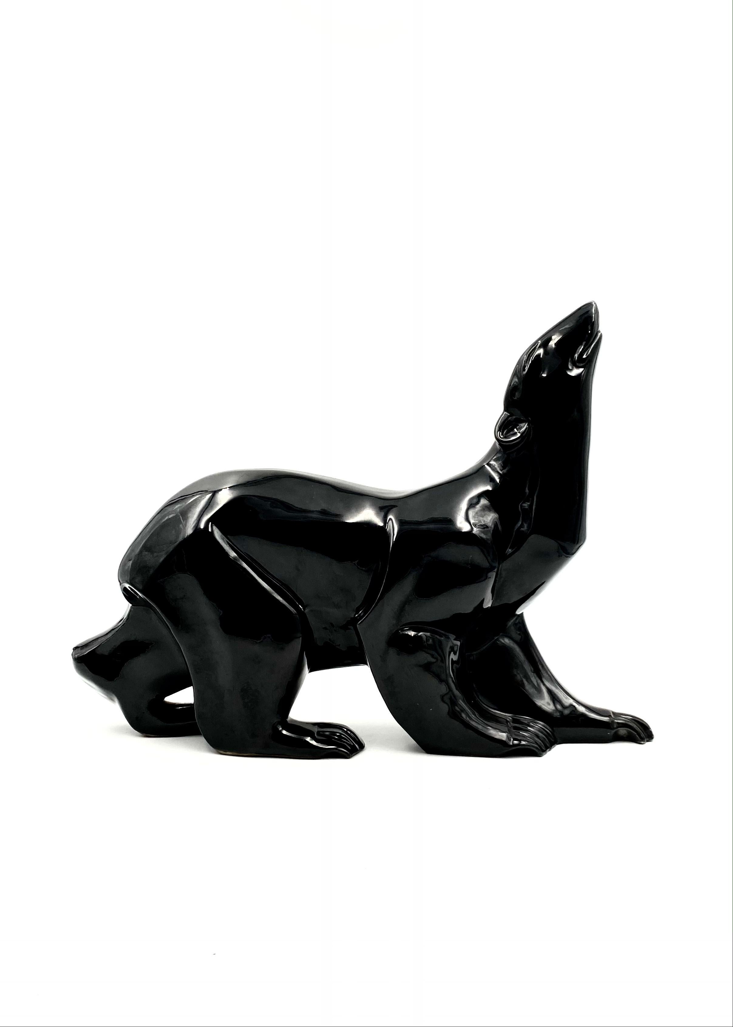 Saint-Clément Art Deco black polar bear figure. Executed in black glaze.

Saint-Clément, France, 1927 - 1929

Signed by Desbarbieux. Marked Saint-Clément.

35.56×12.7×48.26 cm.

Condition: Excellent, no repairs.