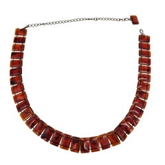Description: A definitive accessory of the 1970s "Mod" revival, this chunky link