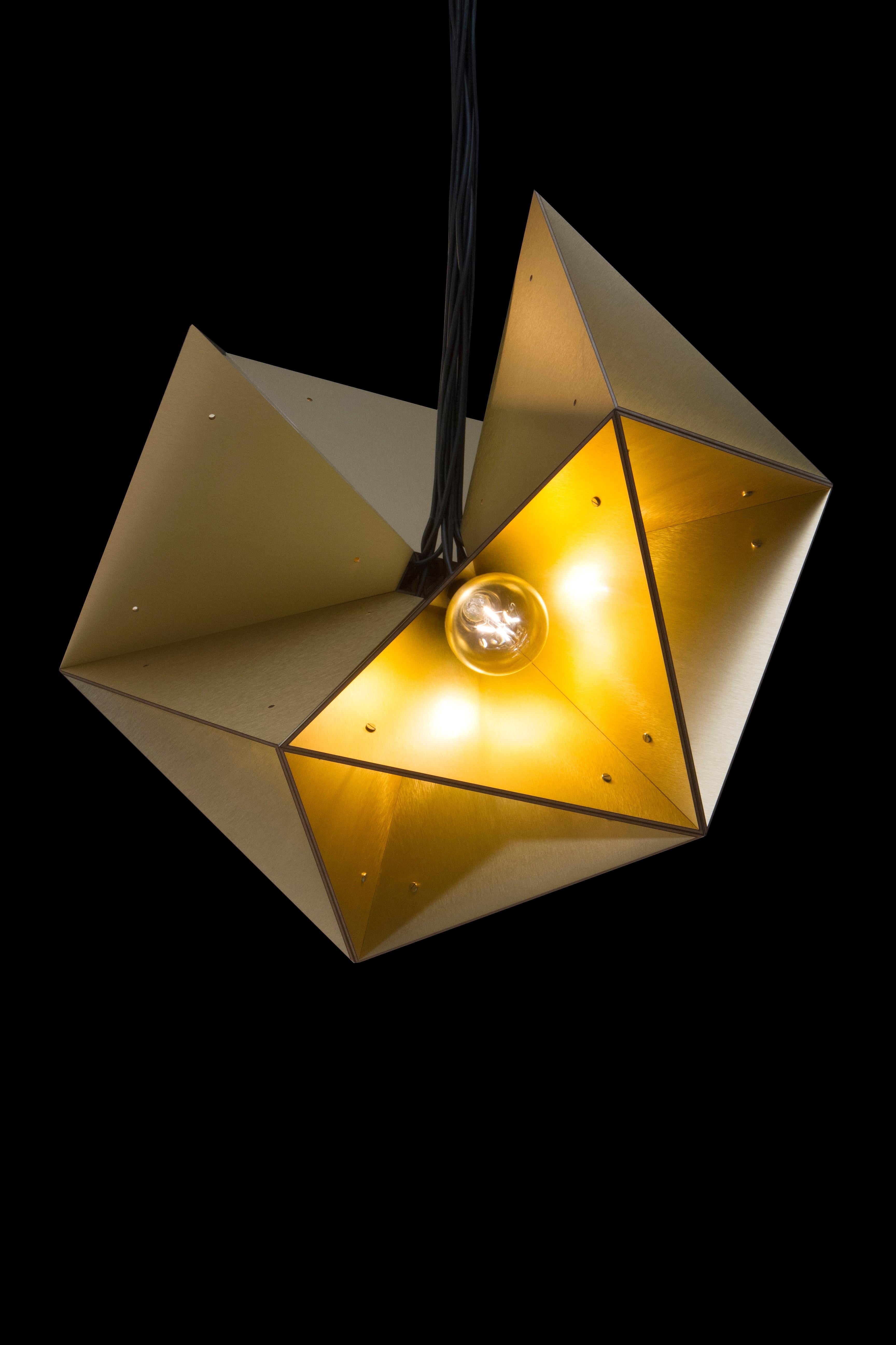 Modular laminated lamp in golden formica. Accompanied with canopla. This piece does not come with the lamp.

About 