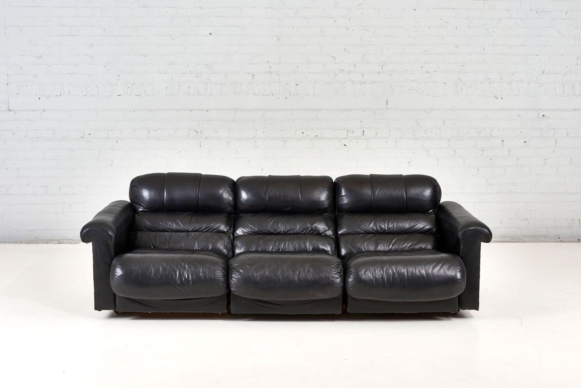 De Sede Black Leather Sofa, 1970. Original leather and each seat individually reclines.