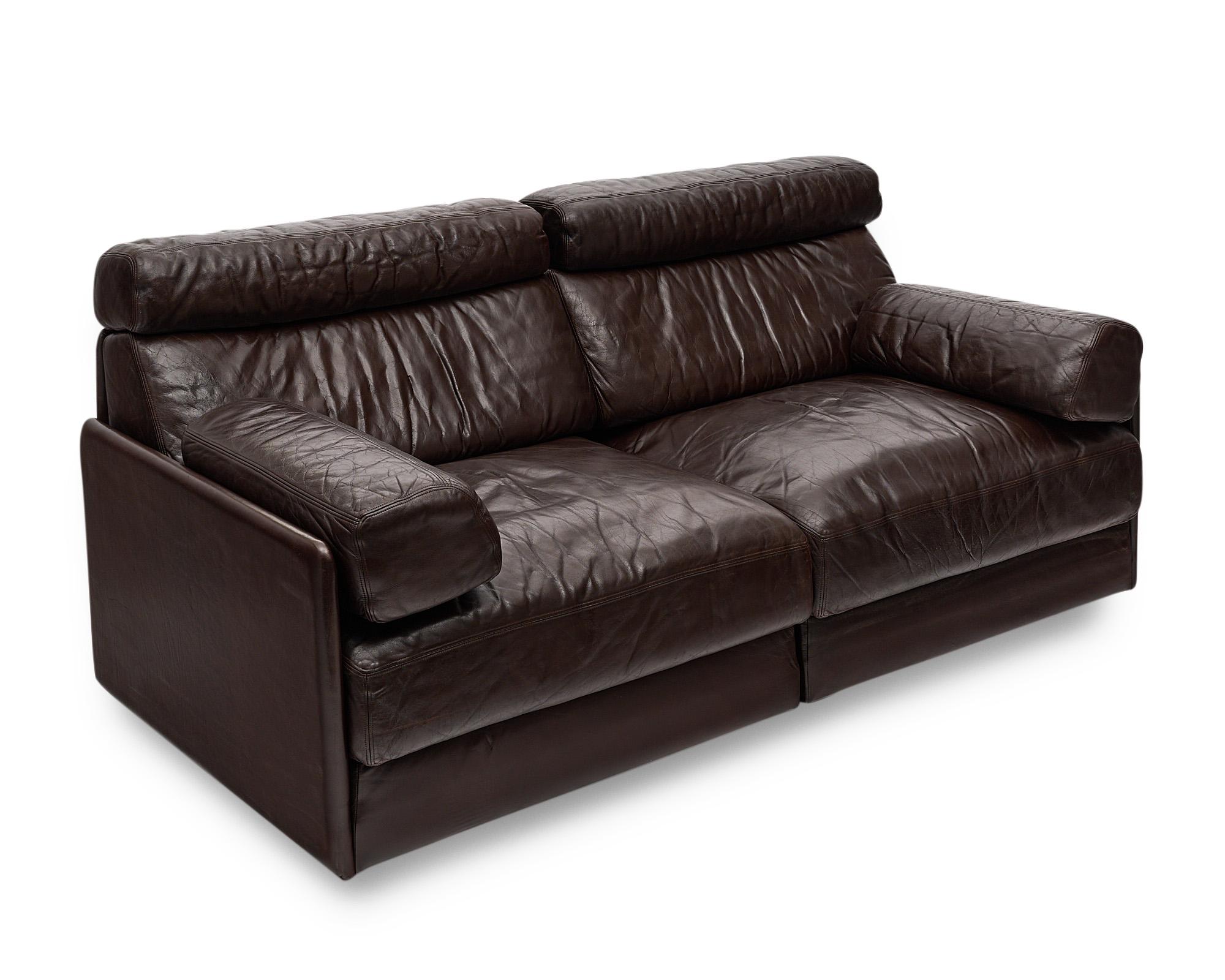 DeSede leather sofa, circa 1970, of thick leather brown hide. The iconic leather sofa is comfortable and versatile, all zippers are in great condition. The piece is signed.