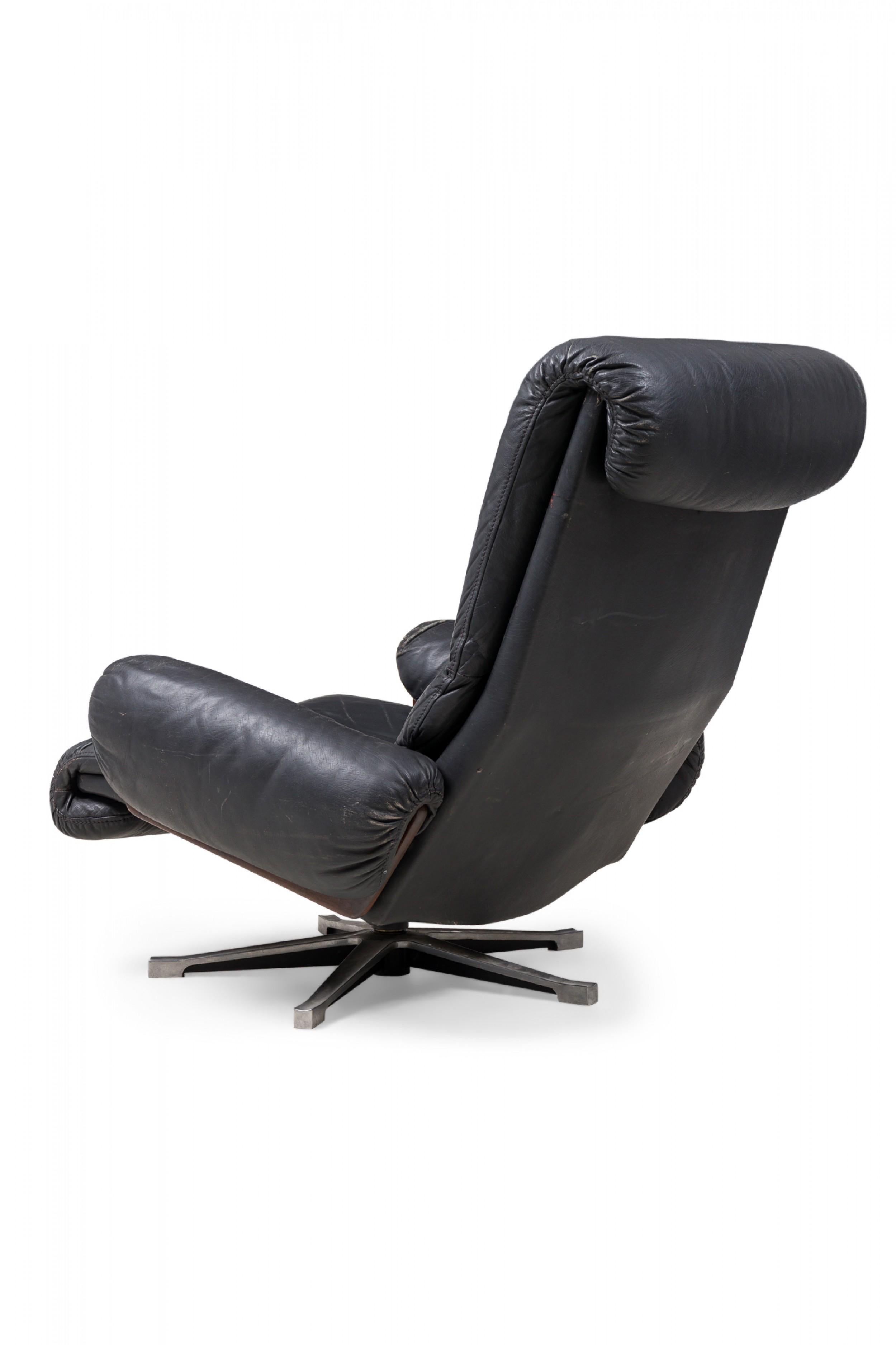 20th Century Desede Midcentury Swiss Metal & Black Leather Upholstered Swivel Chair For Sale