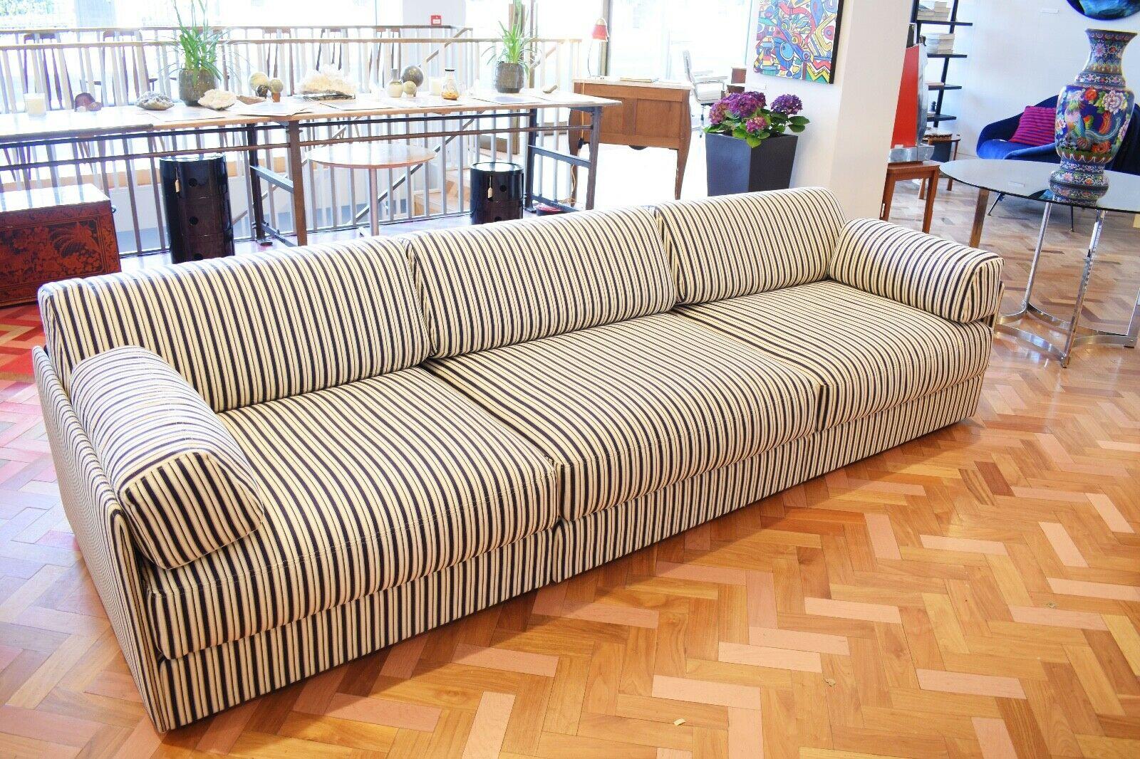 A timeless & stylish De Sede sofa which has been upholstered in a high quality striped linen. 

This sofa features a fold out function so can be easily turned into a sofa bed. 

The sofa is a module design so can be split into three parts and