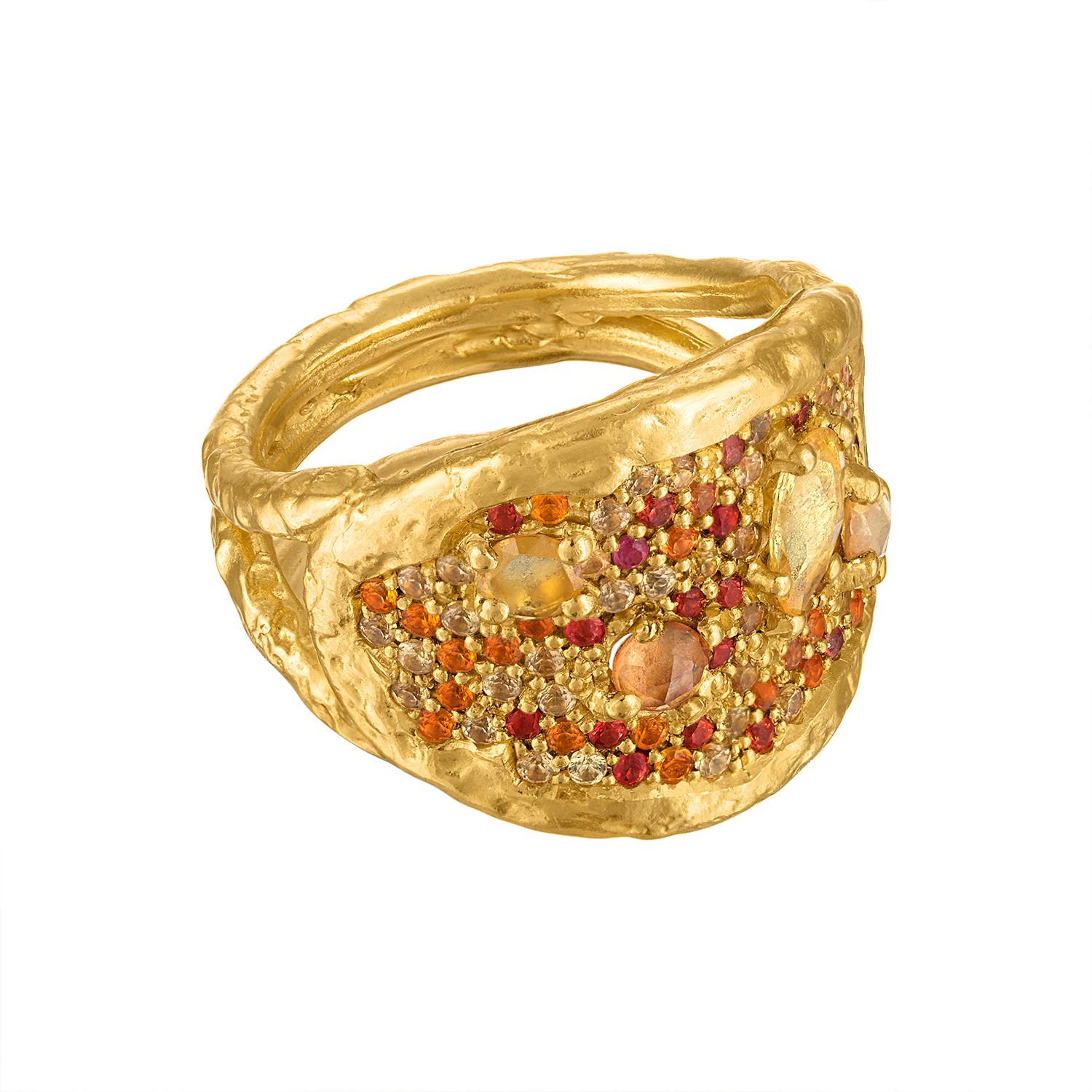 This exquisite 22k gold ring is a symphony of color and light, the Desert Bloom ring showcases a stunning array of pave-set gemstones, all set in 22k gold. The gemstones sparkle and shimmer like a sunburst. The ring is crafted with meticulous