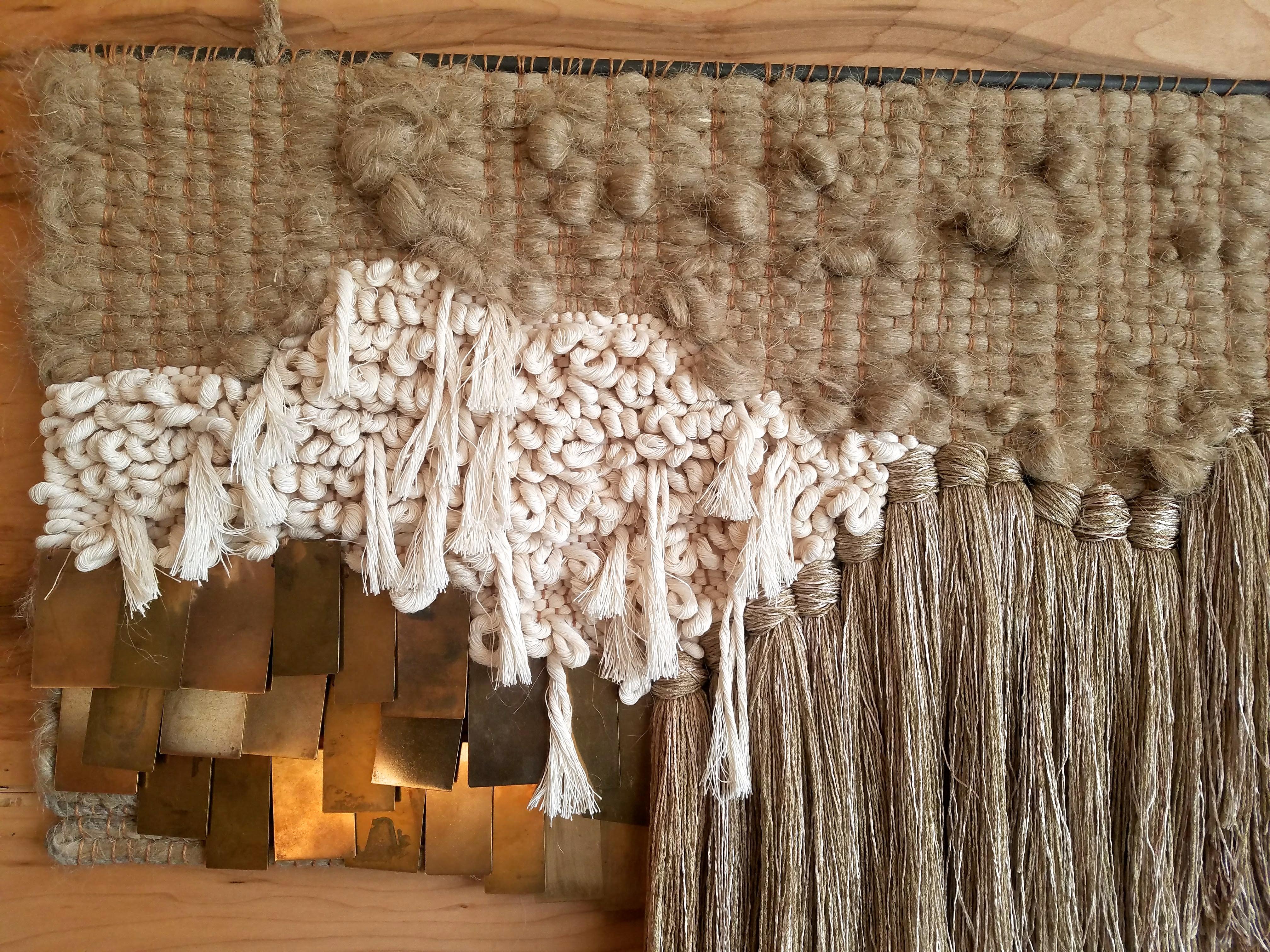 Handwoven, tapestry style, woven wall hanging by Janelle Pietrzak of All Roads. Inspired by the desert landscape. Rich use of texture and neutral colors like cream, hemp and beige creates depth in this piece. Fibers used are hemp, natural cotton