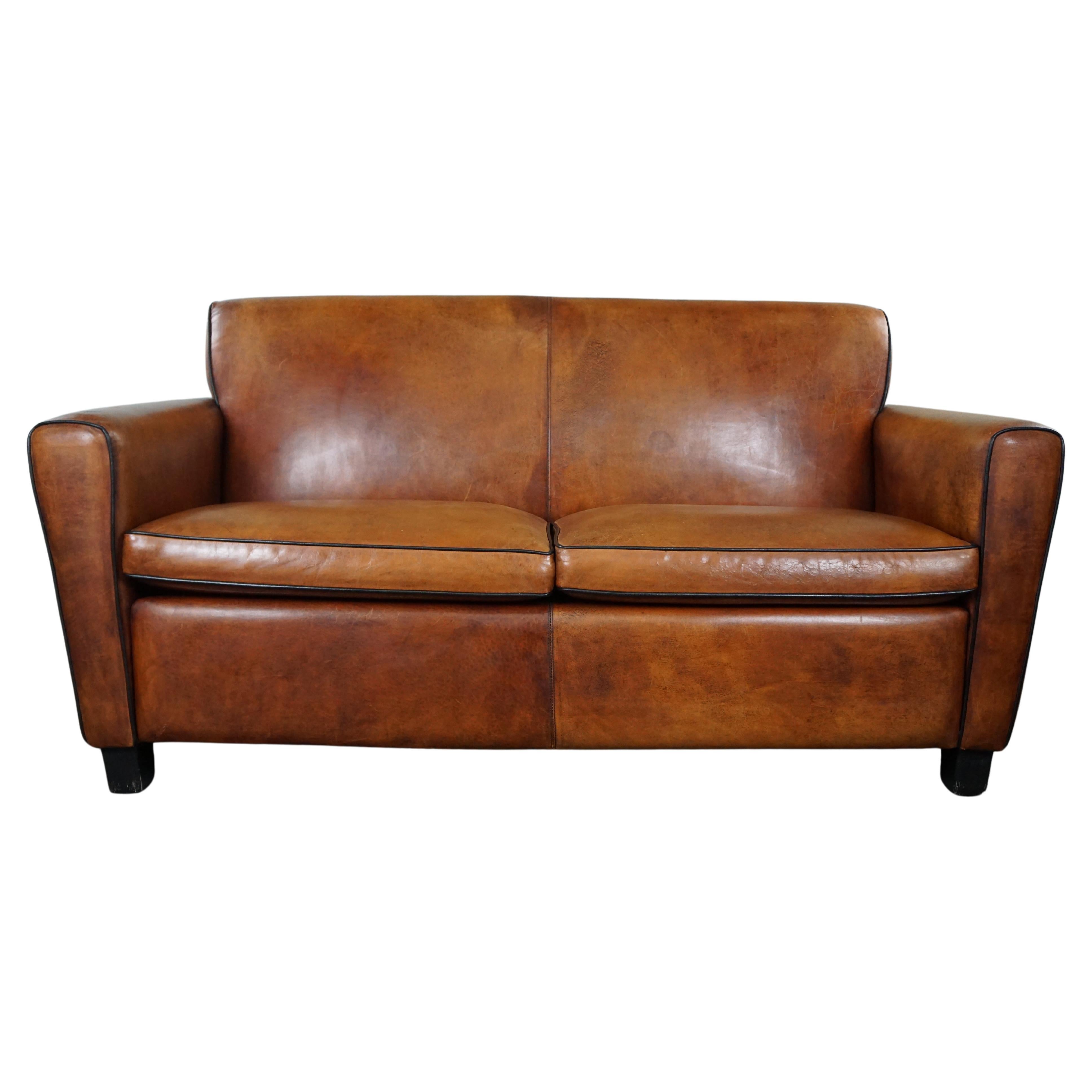 Design 2.5-seater sheep leather sofa For Sale
