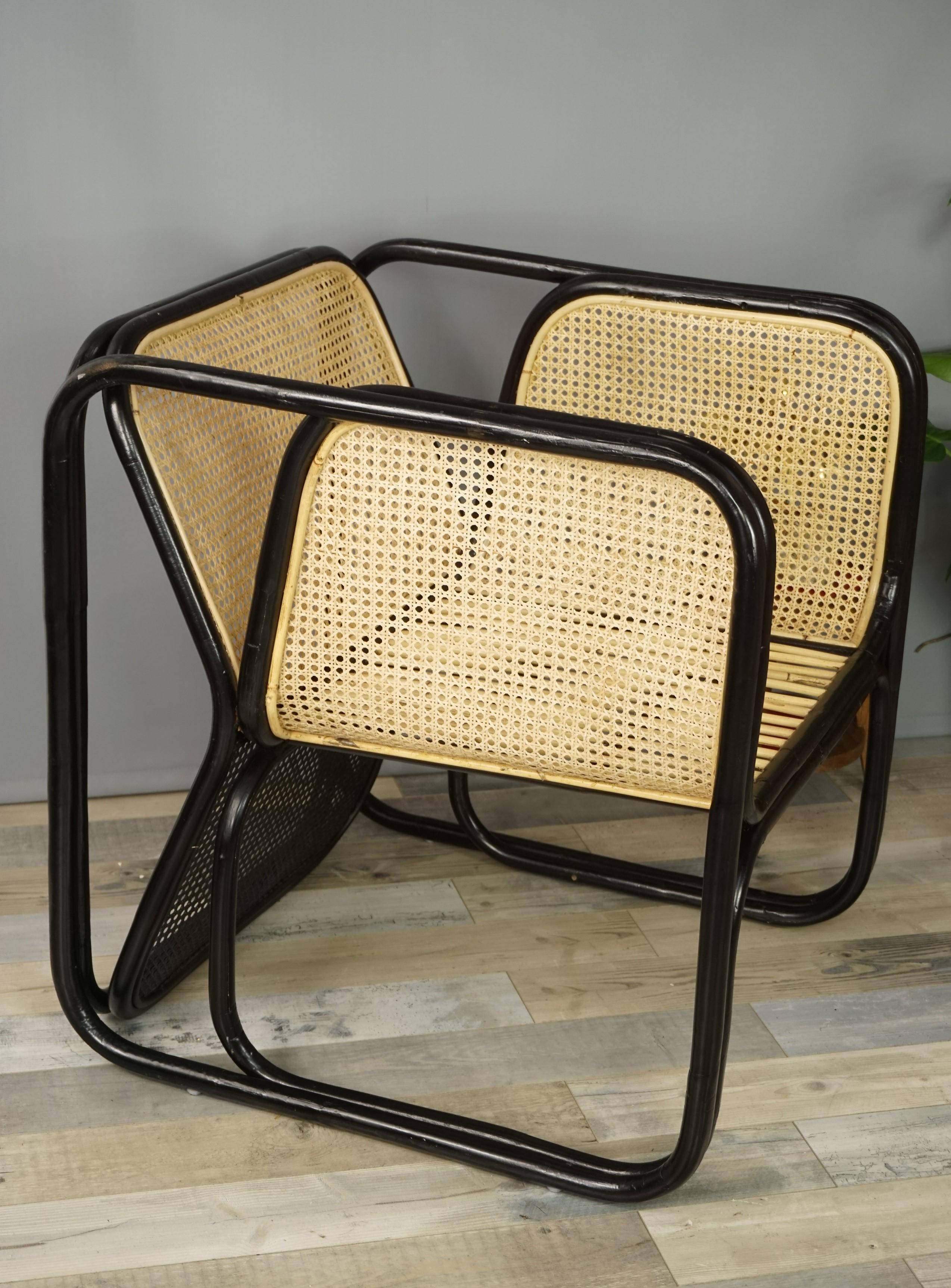 Design and original lounge armchair with black and natural rattan and cane airy structure at the manner of Jan Bocan for Thonet.