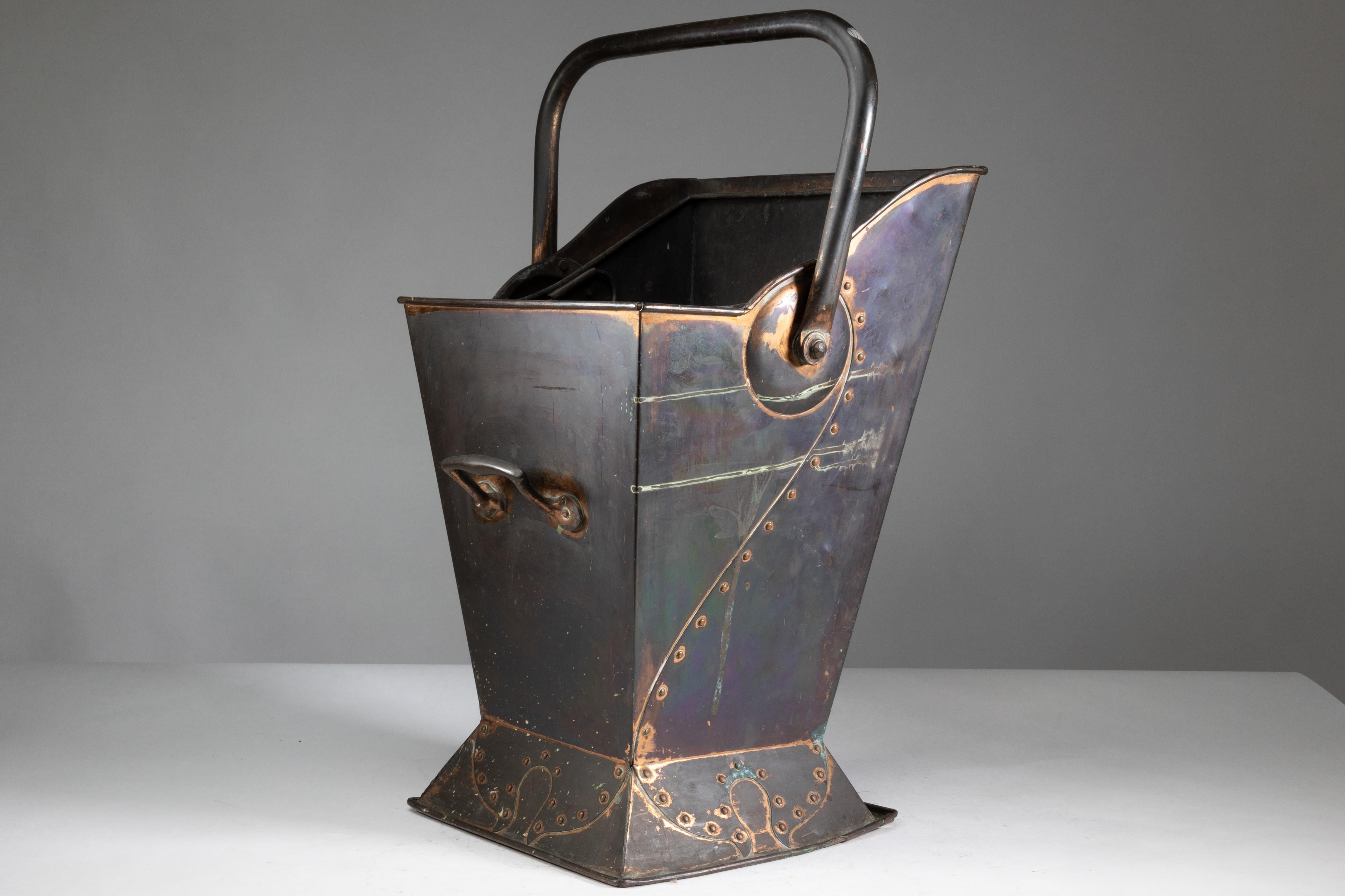 Robert Hilton. An Arts & Crafts copper coal bucket with a single flower in seed. In Good Condition For Sale In London, GB
